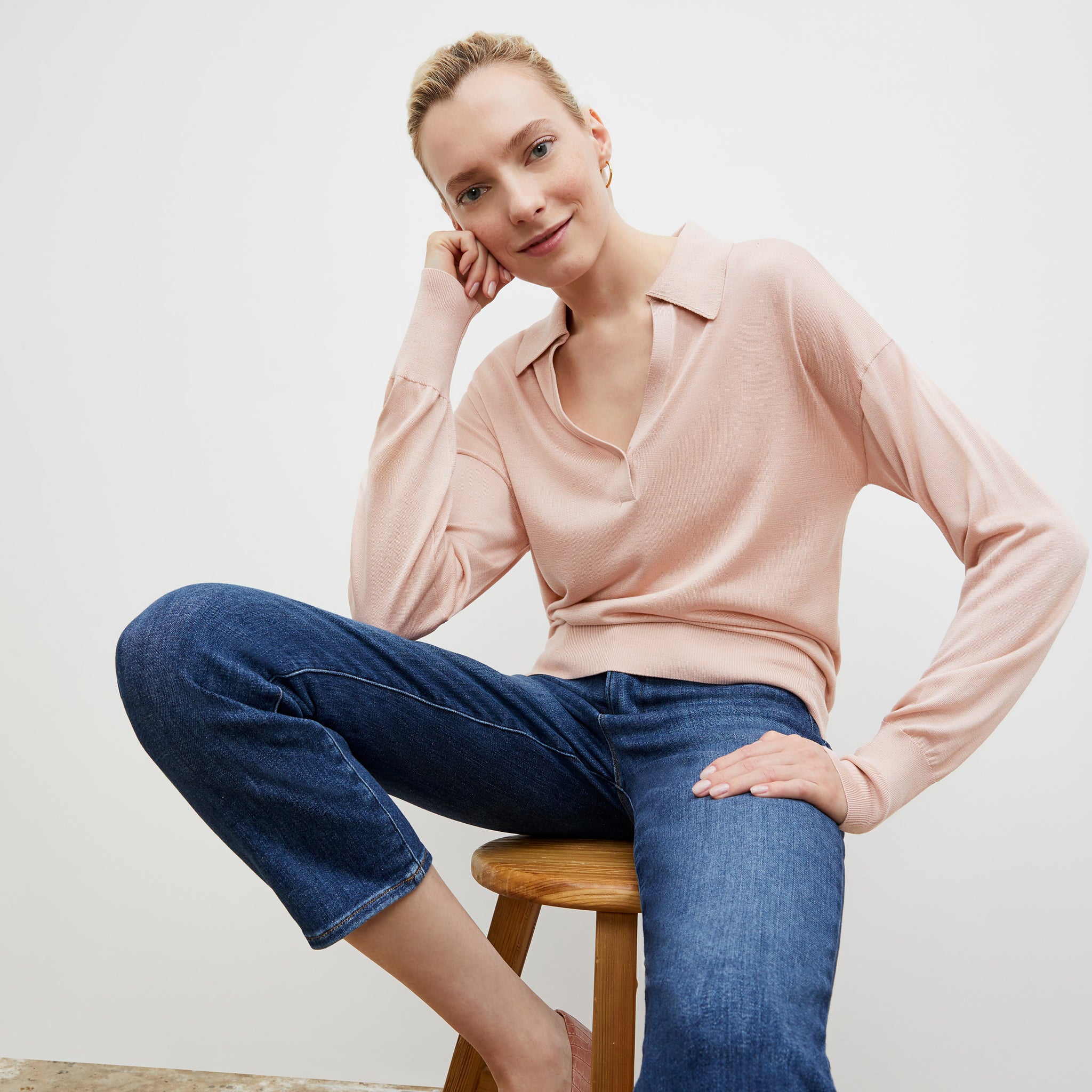 Front image of a woman wearing the Leo Top in Pink Salt