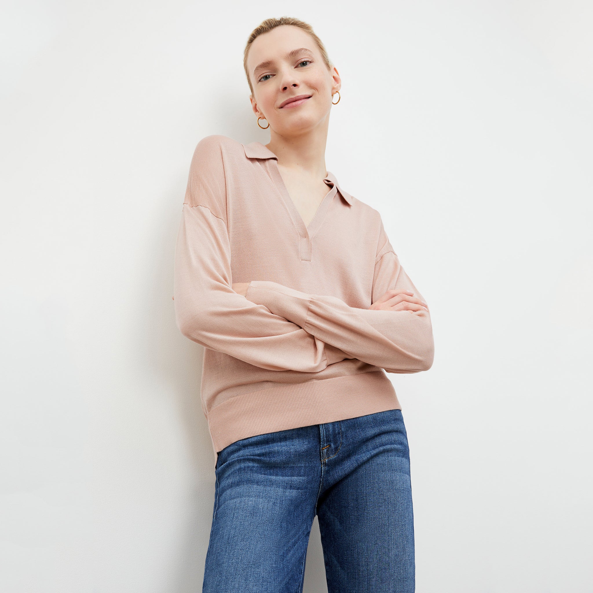 Front image of a woman wearing the Leo Top in Pink Salt