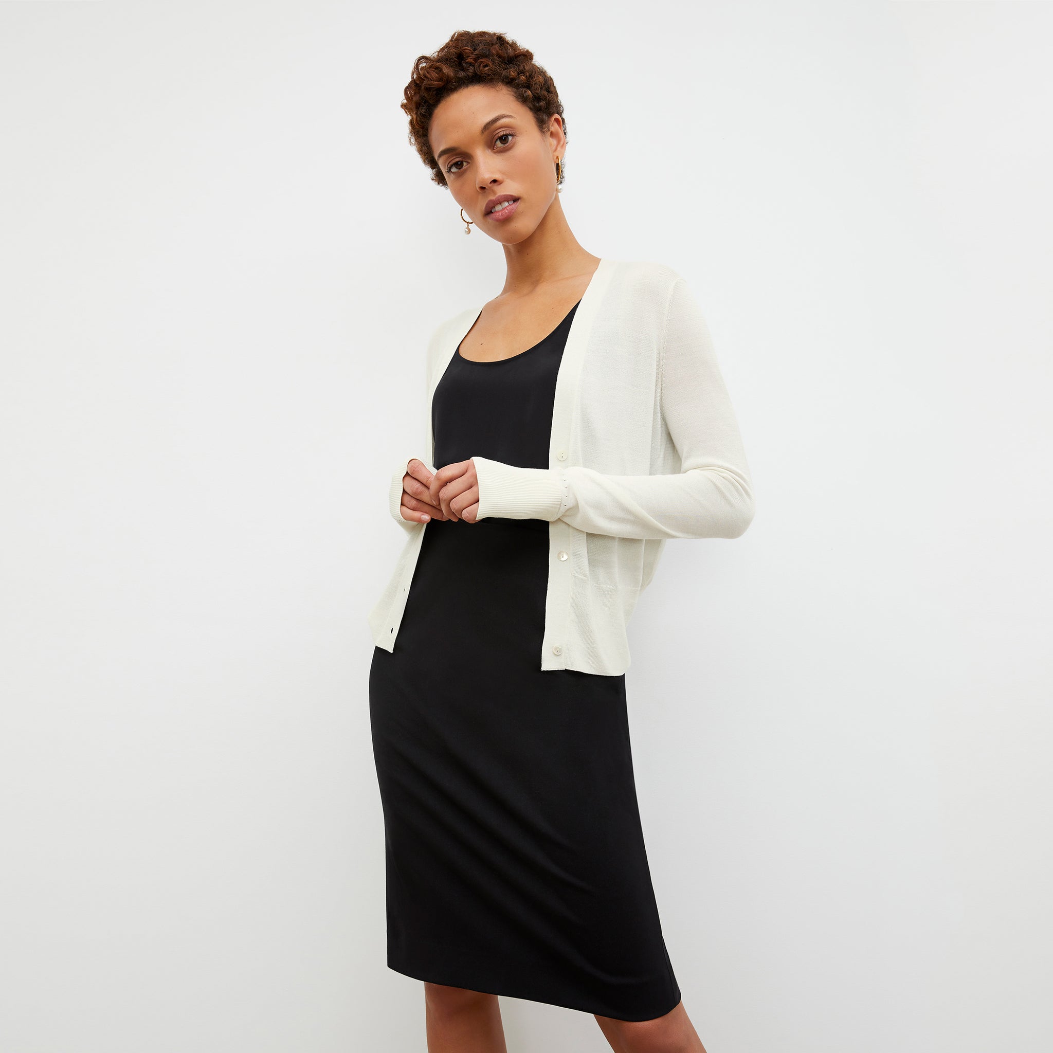 Front image of a woman wearing the Rory Cardigan - Silk Jersey in Ivory