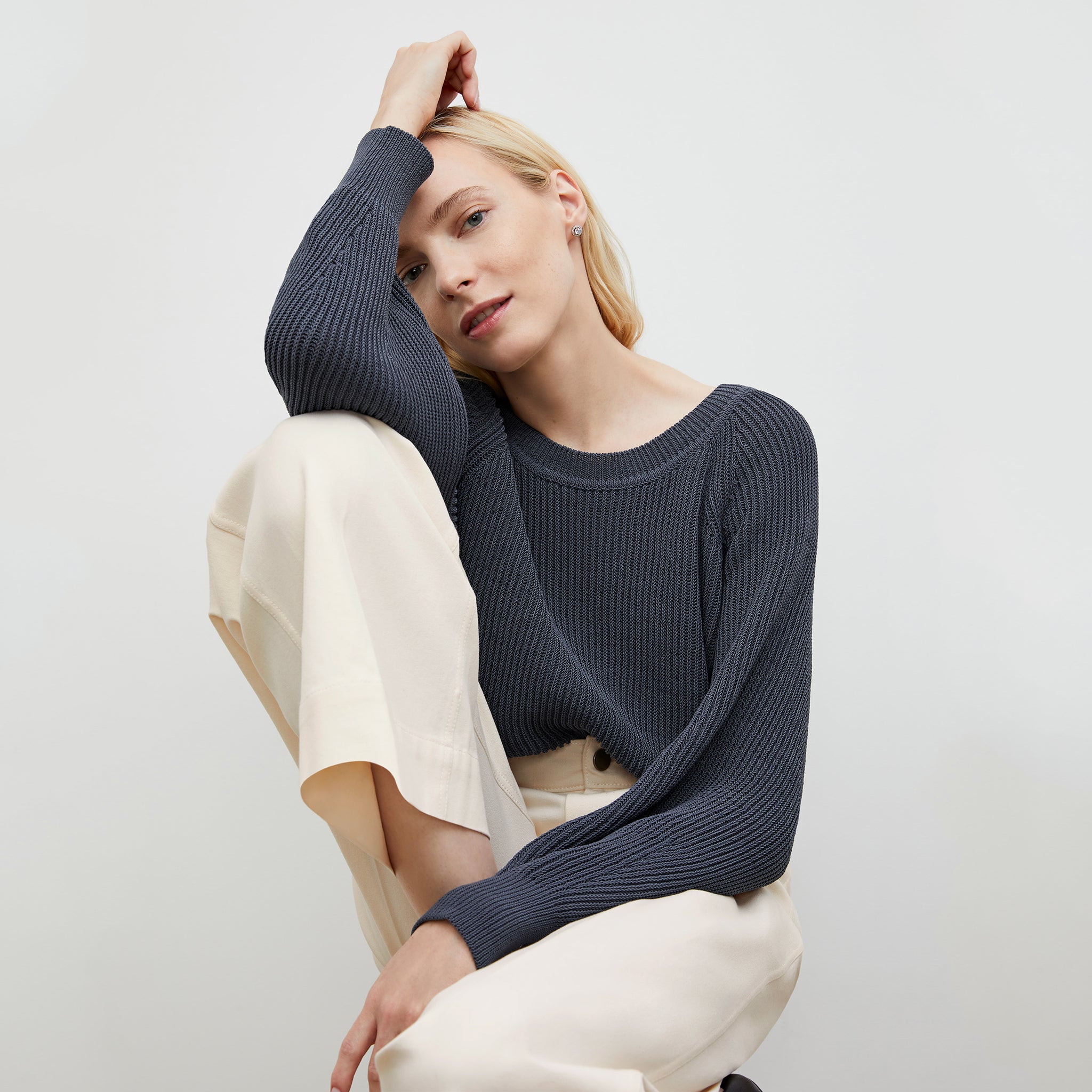 Front image of a woman wearing the Jo Sweater - Sleek Cotton in Dusty Indigo