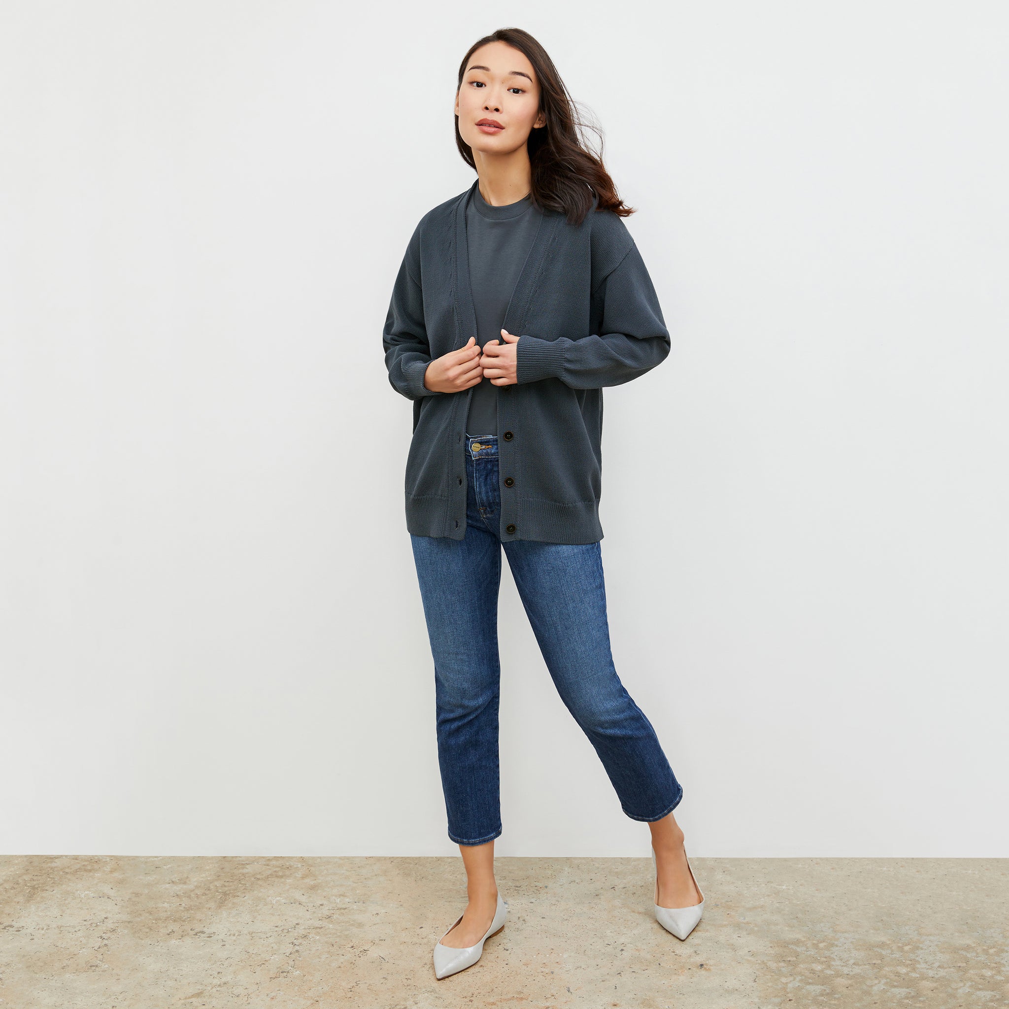 Front image of a woman wearing the Cookie Cardigan - Sleek Cotton in Dusty Indigo 