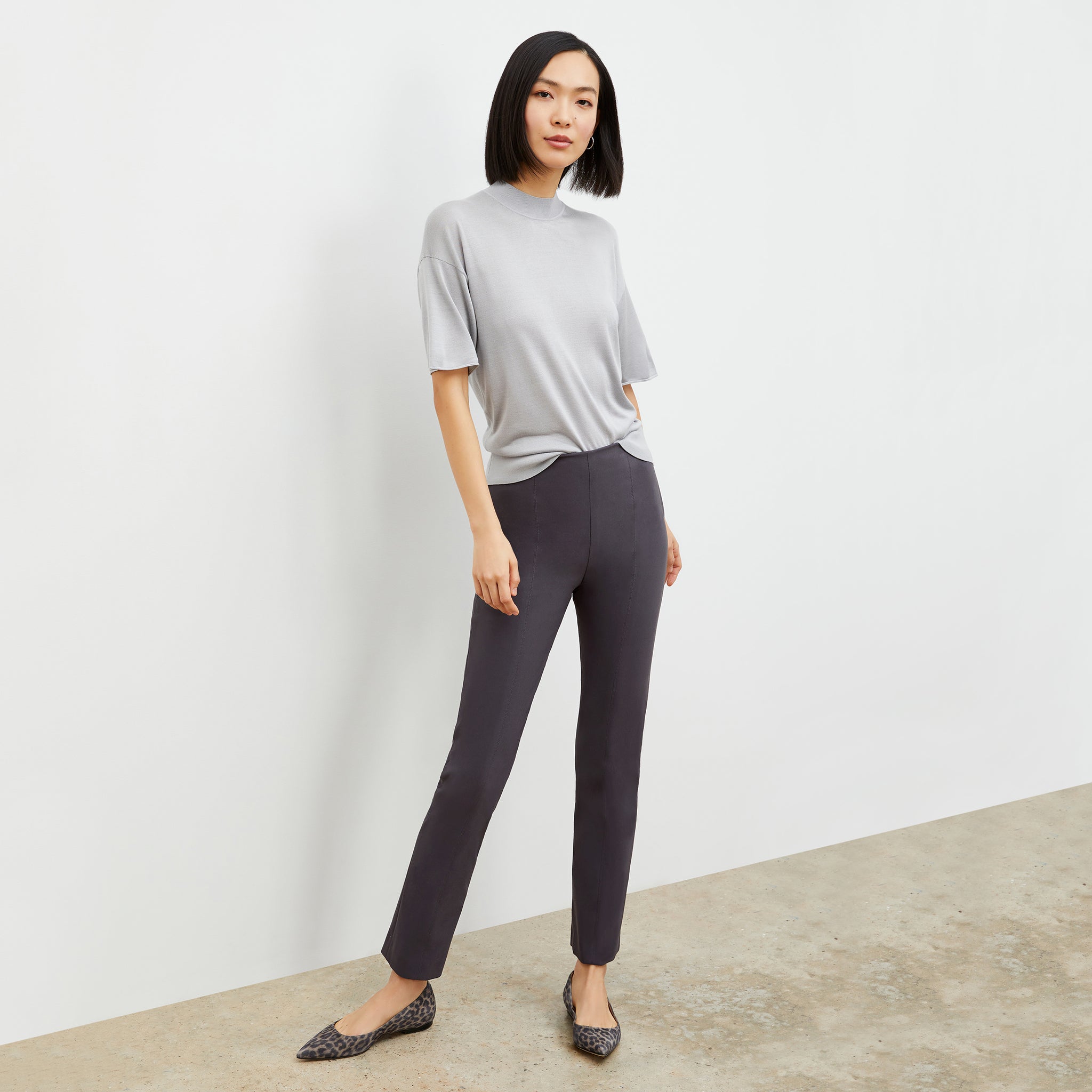 Front image of a woman wearing the Mia Top in Pale Gray 