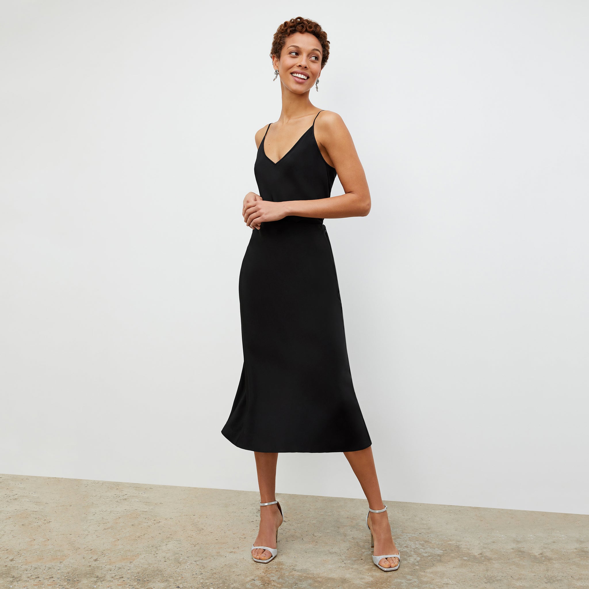 Front image of a woman wearing the Lisey Cami - Washable Silk in Black