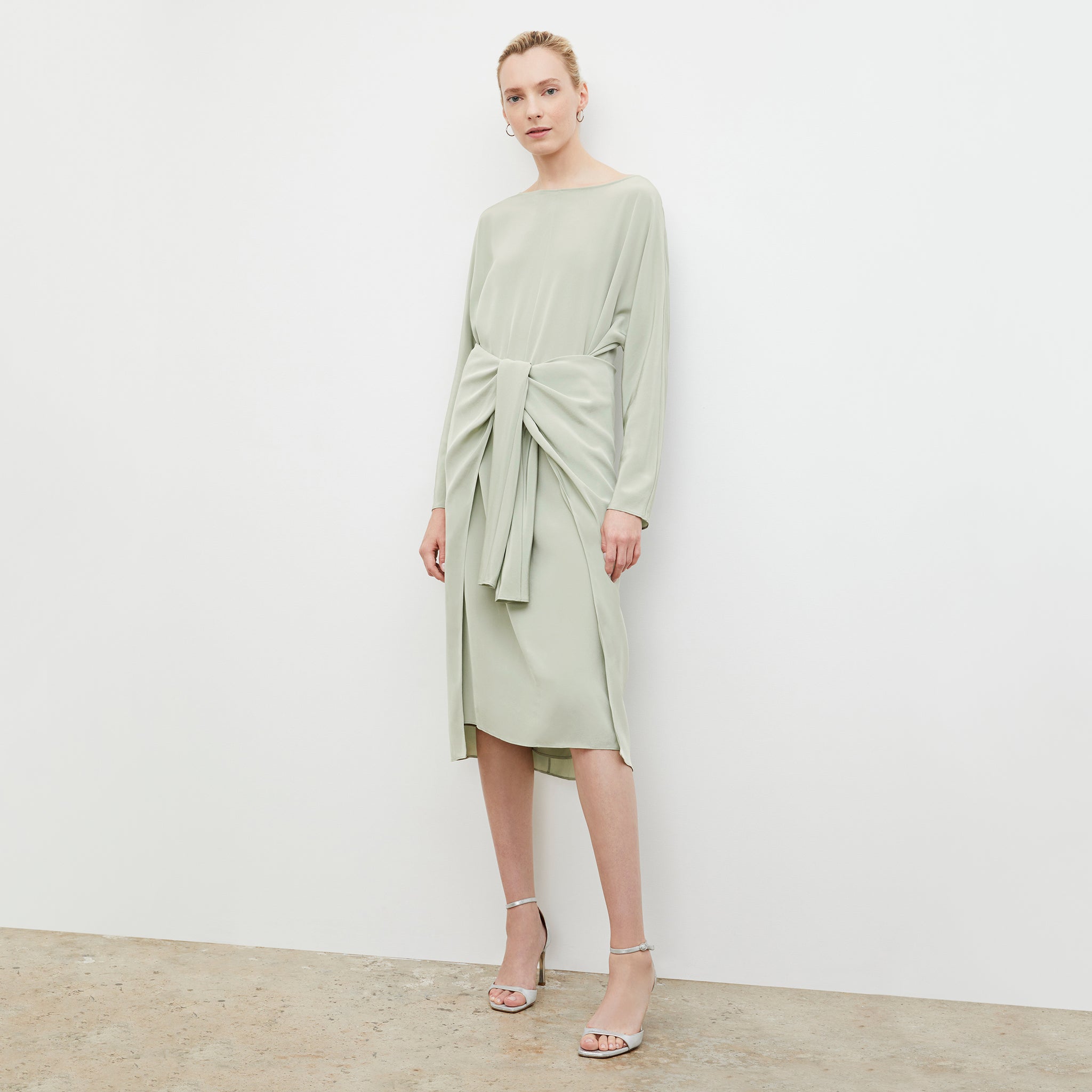 Front image of a woman wearing the Rashmeen dress in Minty Green 