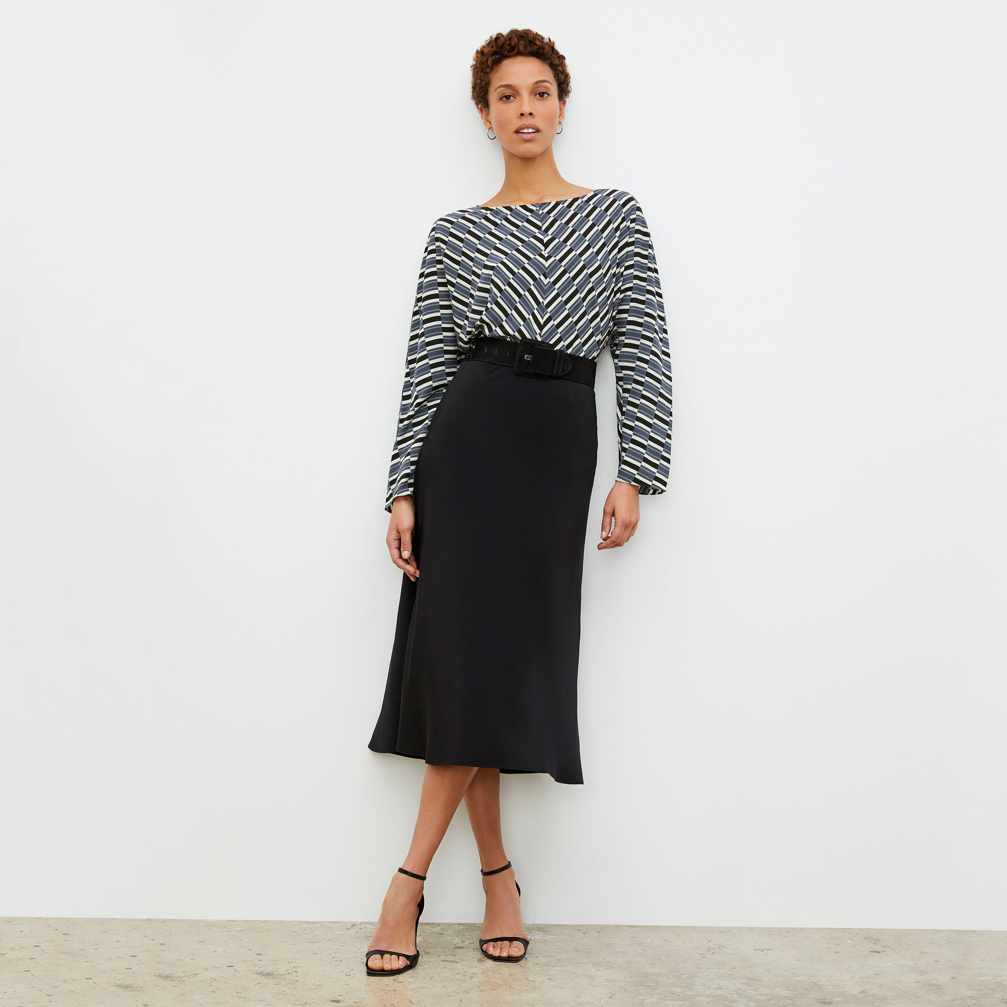 Front image of a woman wearing the Wren Top - Arpeggio Print Washable Silk in Blue / Black