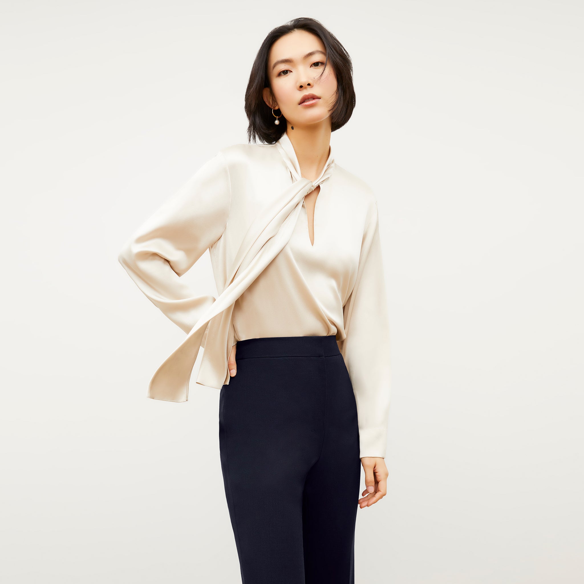 Front image of a woman wearing the Darcy Top - Washable Silk Charmeuse in Pearl