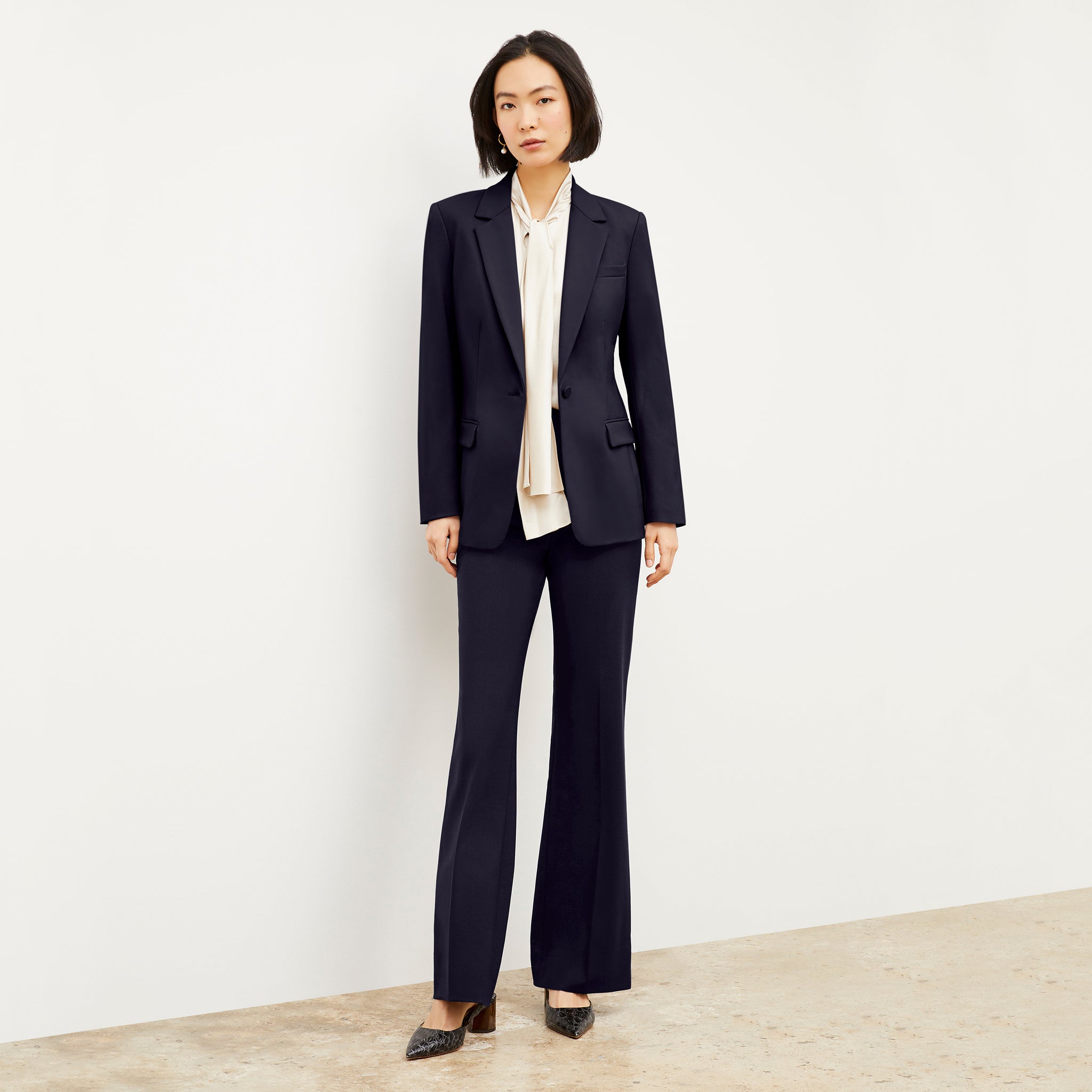 Front image of a woman wearing the Yiyan Blazer in Galaxy Blue