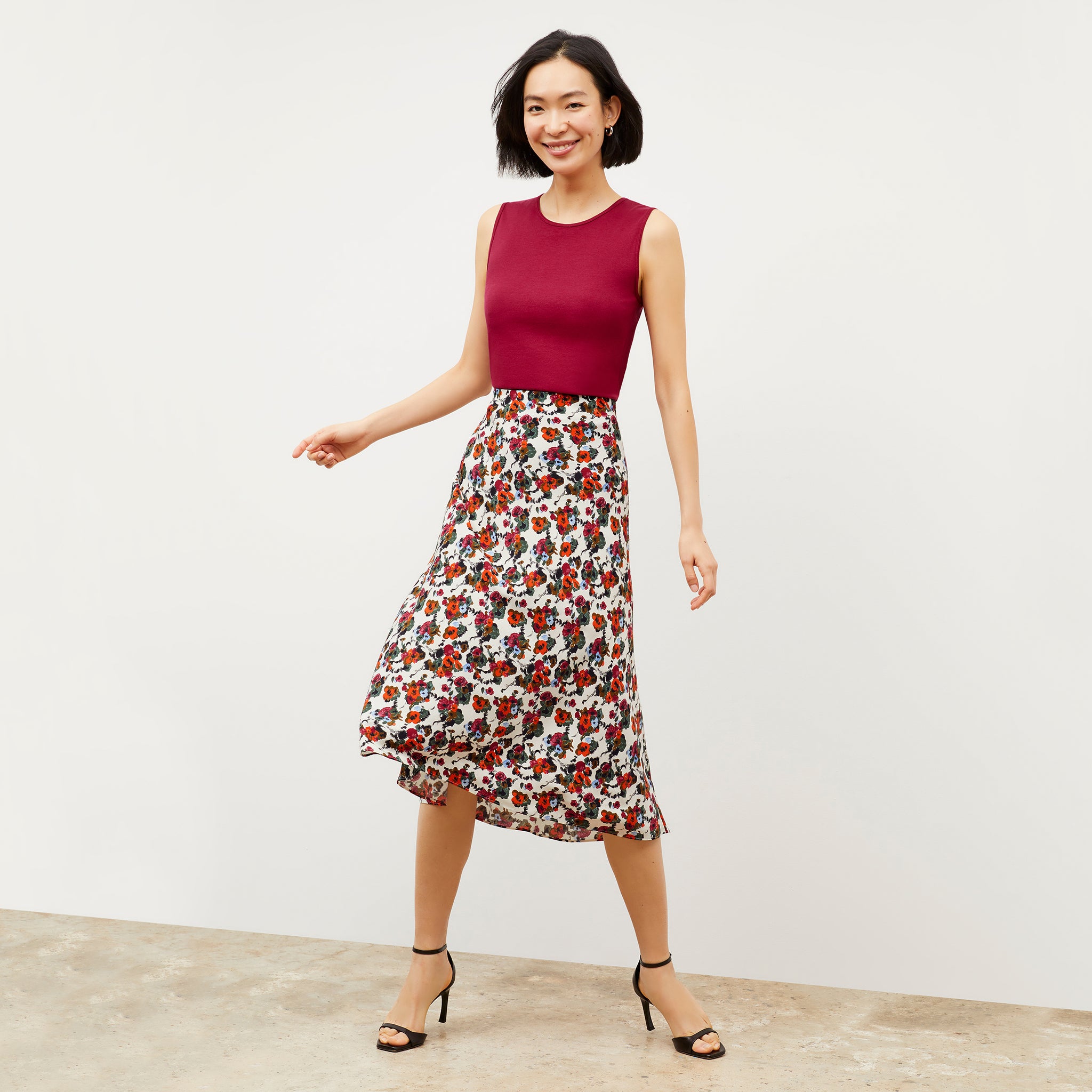 Front image of a woman wearing the Orchard Skirt - Washable Silk in Garden Print 