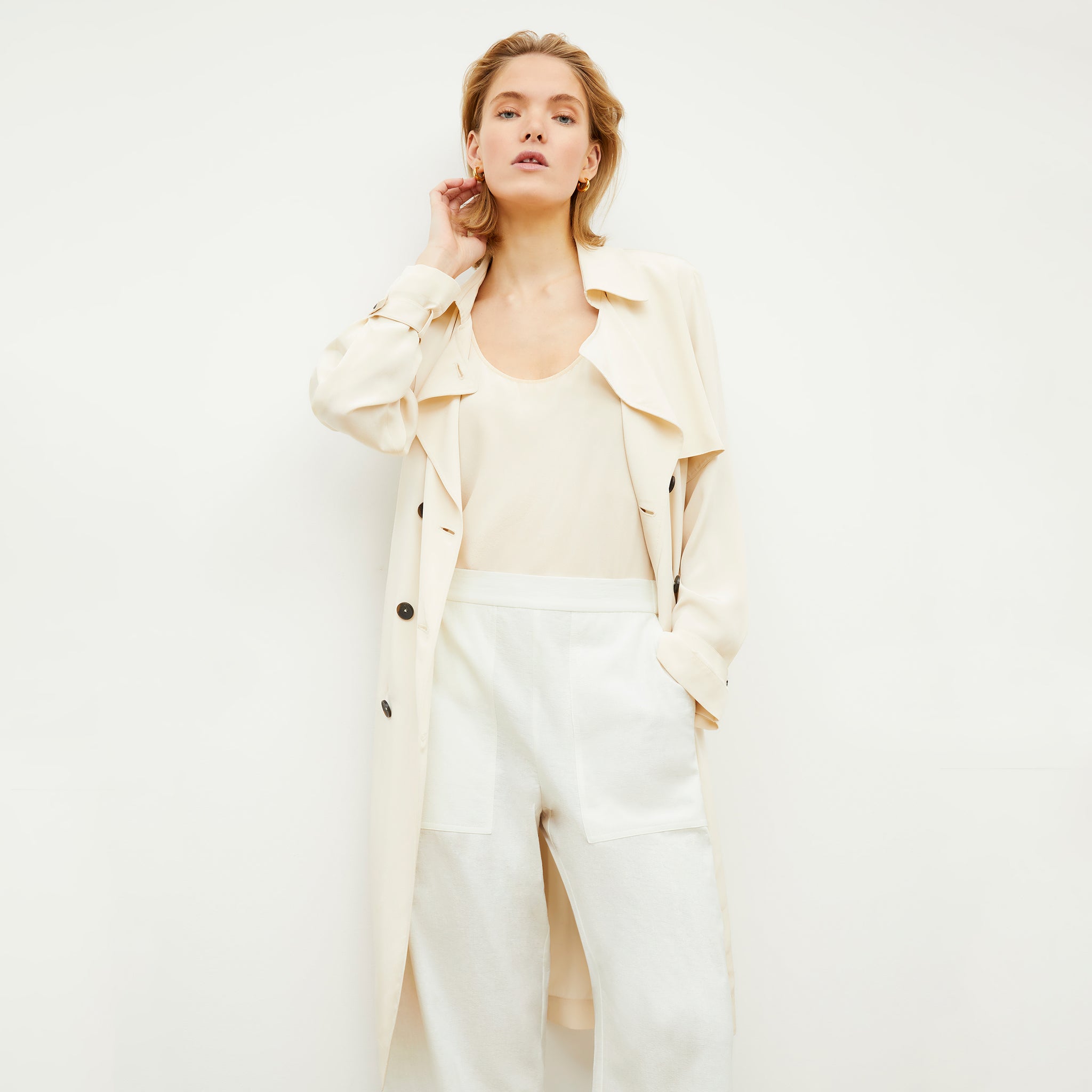 Image of a woman wearing the Madelyn Pant in Ivory