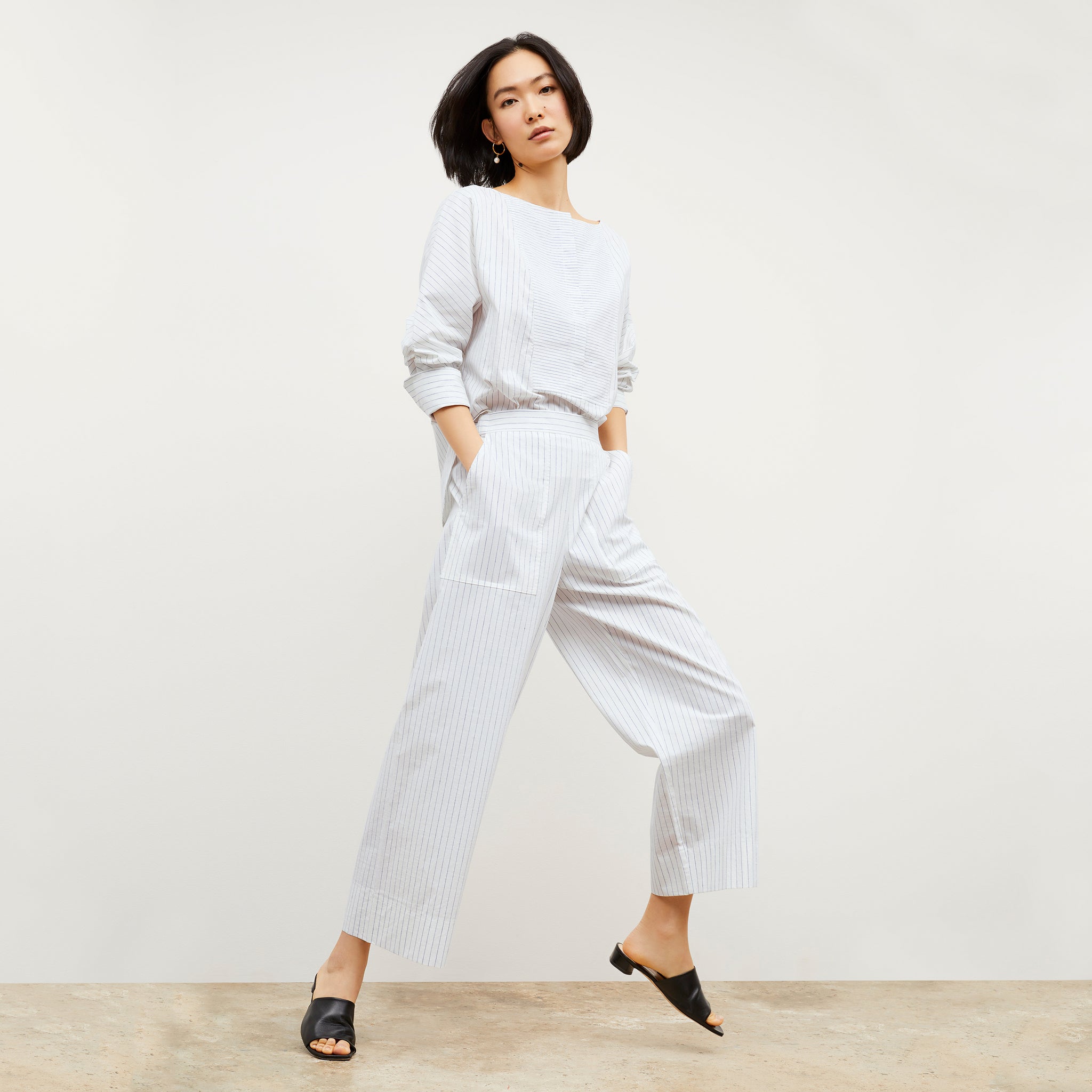 Image of a woman wearing the Madelyn Pant in Blue / Ivory