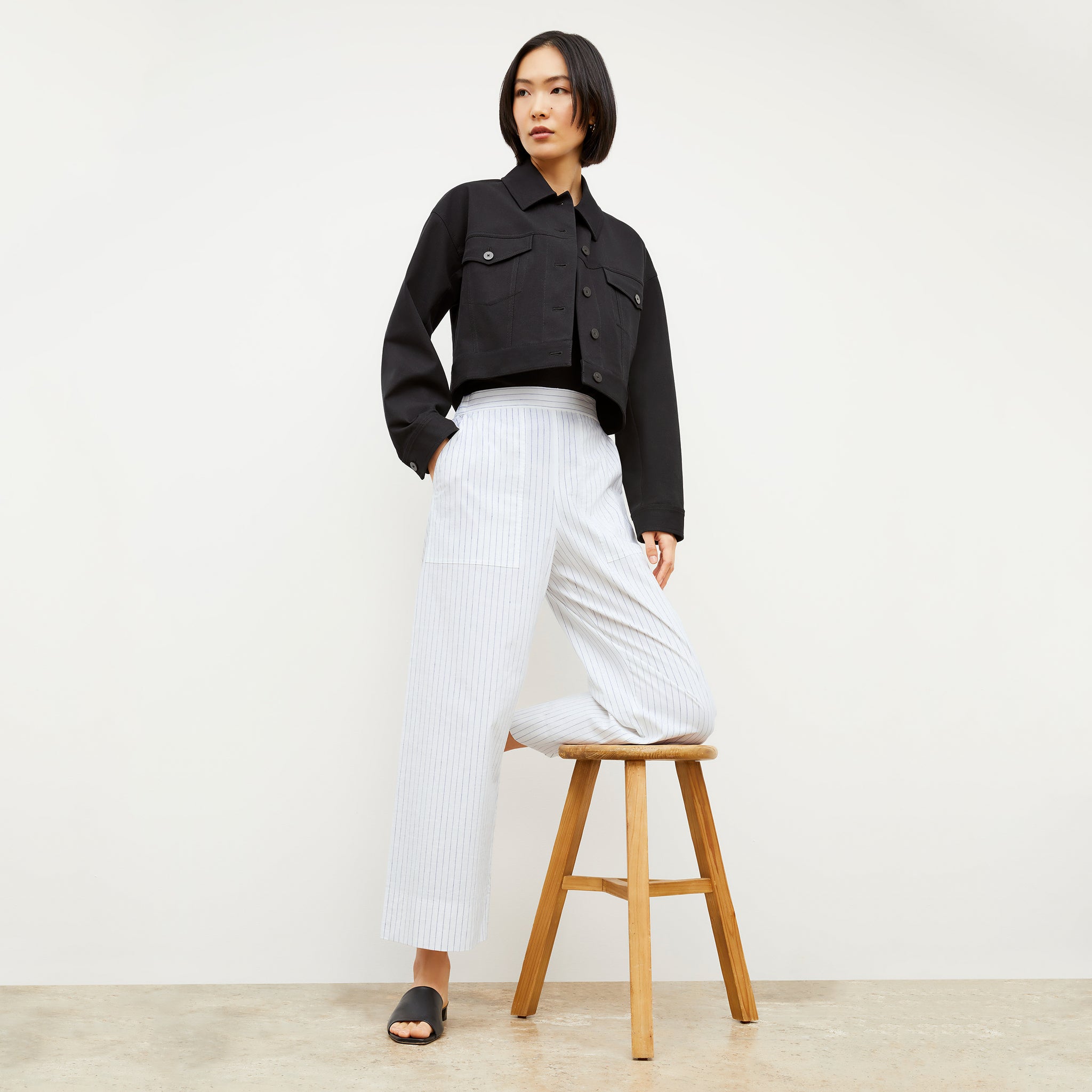 Image of a woman wearing the Madelyn Pant in Blue / Ivory