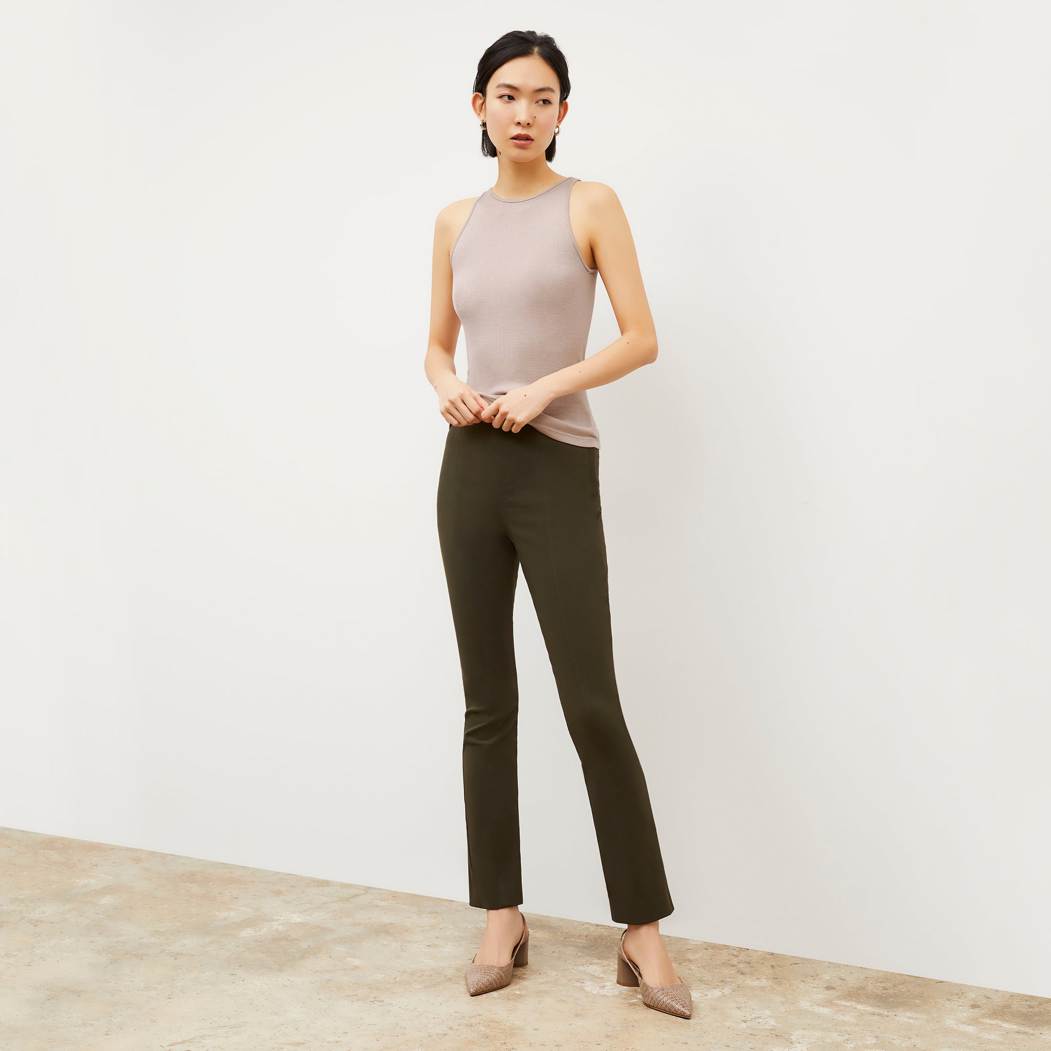 side image of woman wearing foster pant in dark olive