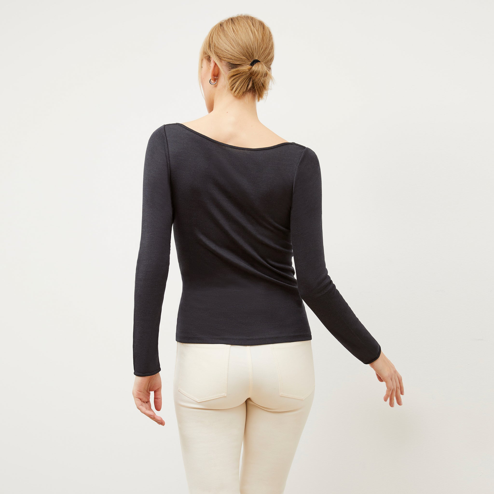 Back image of a woman wearing the Meg Top in Cool Onyx