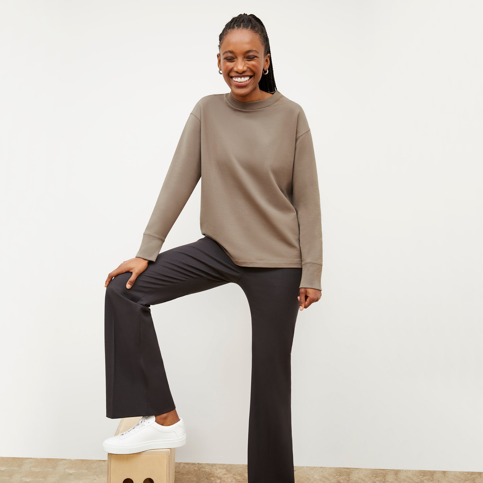Front image of a woman wearing the Ellie Pullover - Light French Terry in Light Truffle