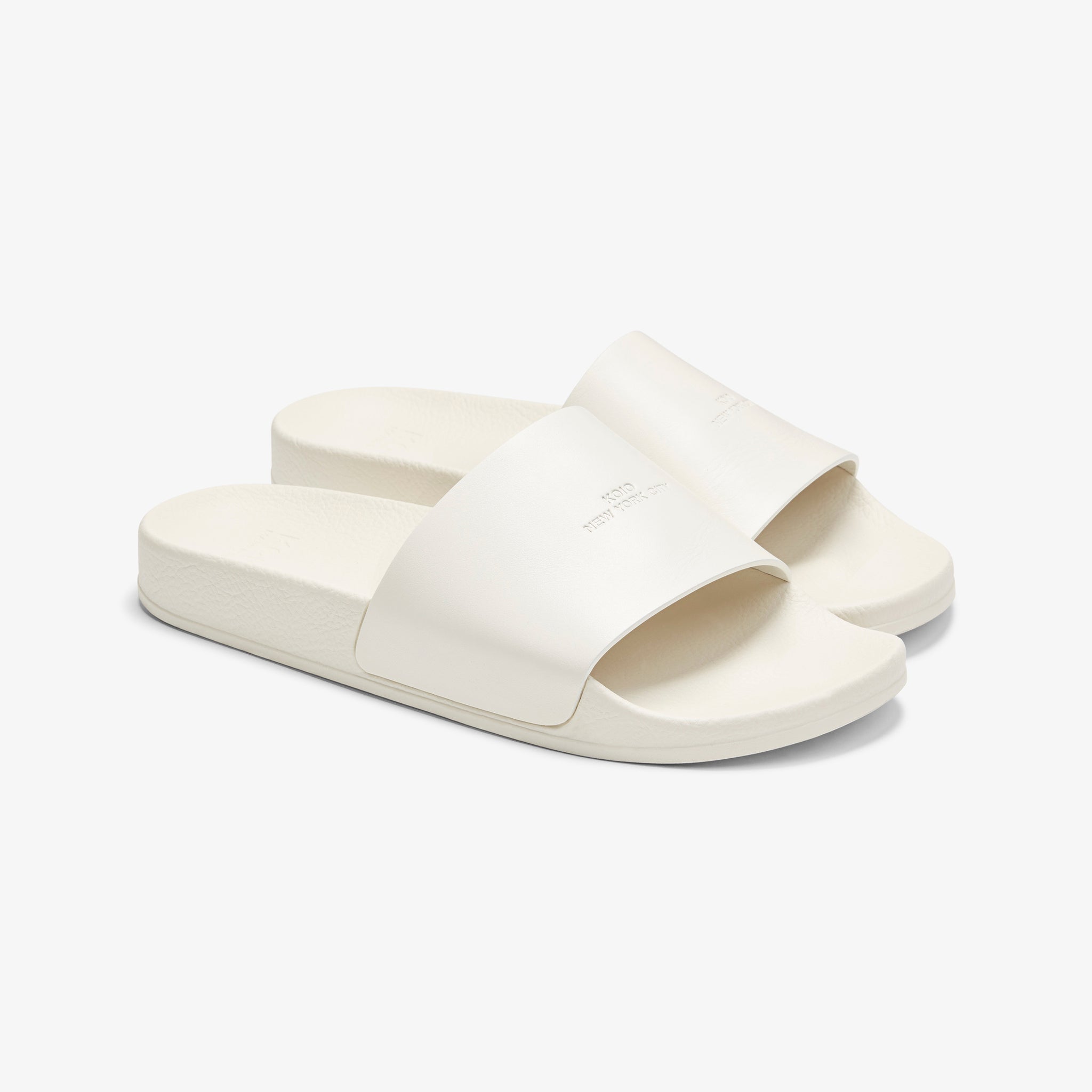 Packshot image of the KOIO Elba Slide - Leather in White 