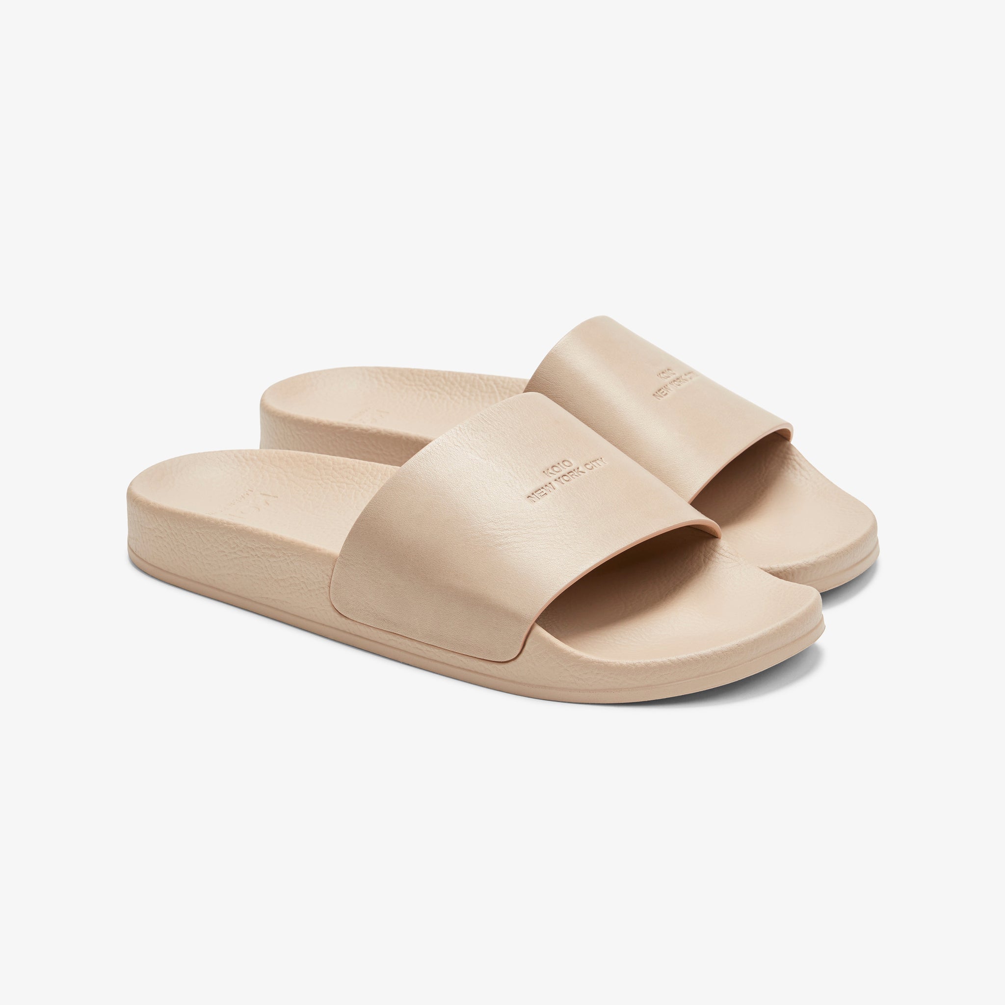 Packshot image of the KOIO Elba Slide - Leather in Taupe 