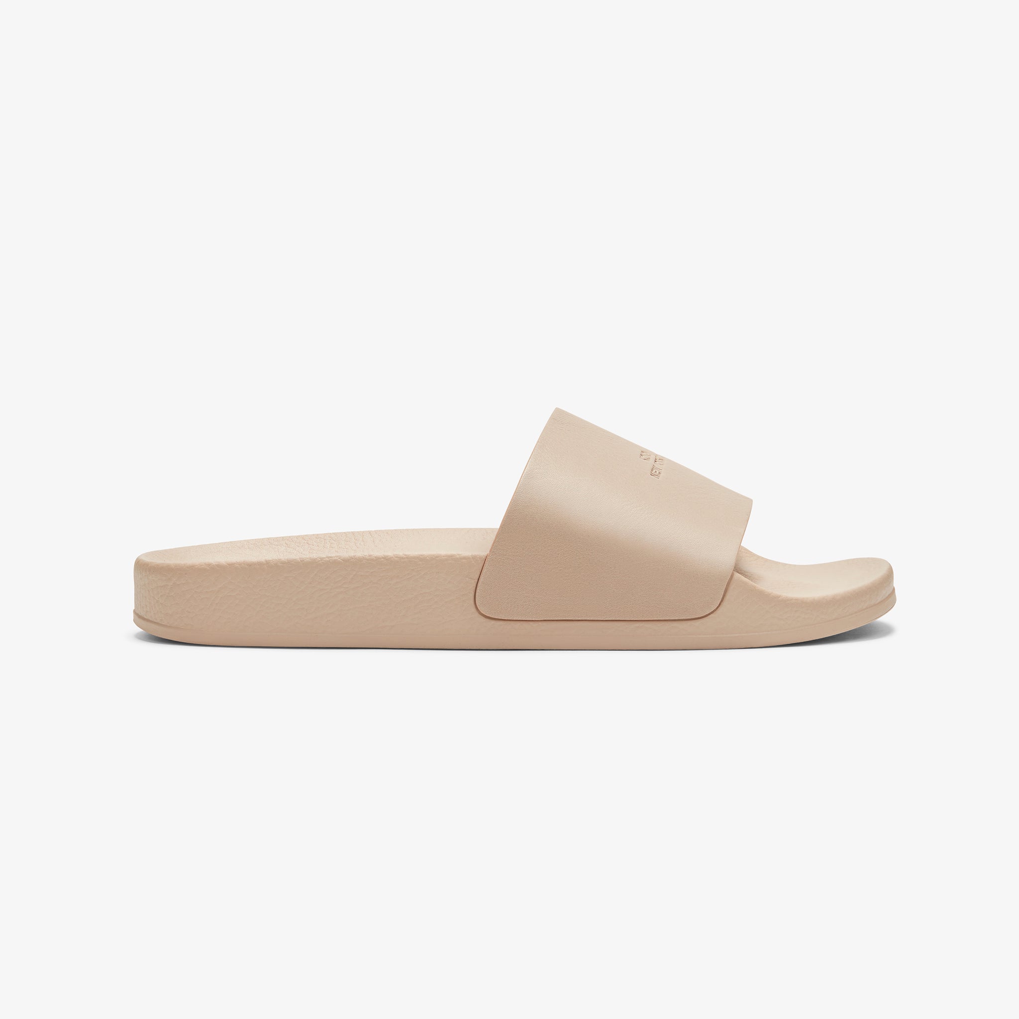 Packshot image of the KOIO Elba Slide - Leather in Taupe