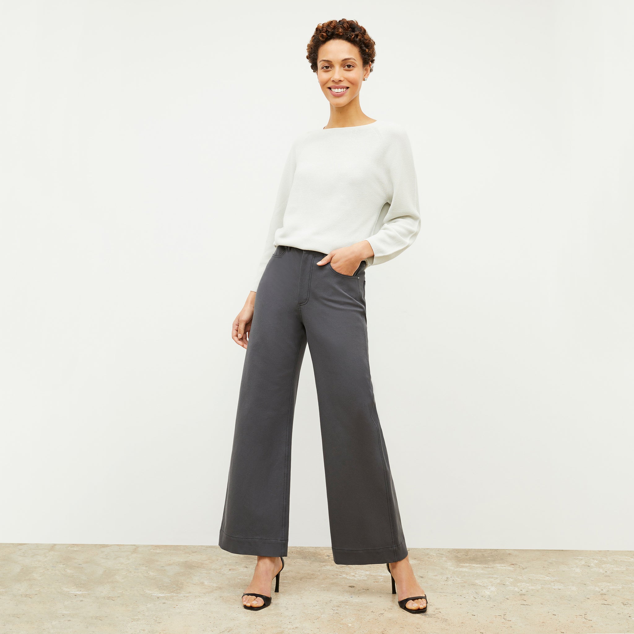 Front image of a woman standing wearing the Milo Jean—Better Than Denim in Cool Charcoal