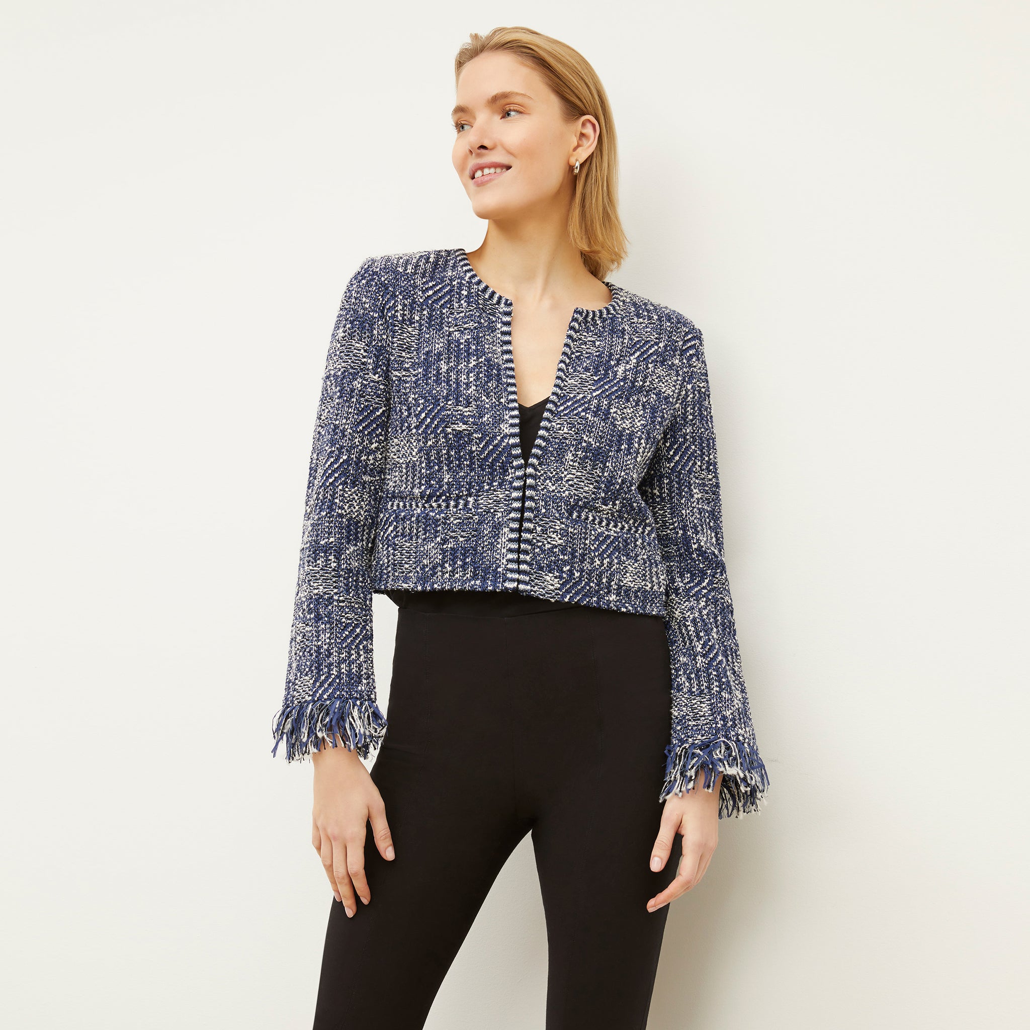 Front image of a woman wearing the Lilia Jacket - Interweave in Navy / Ivory 