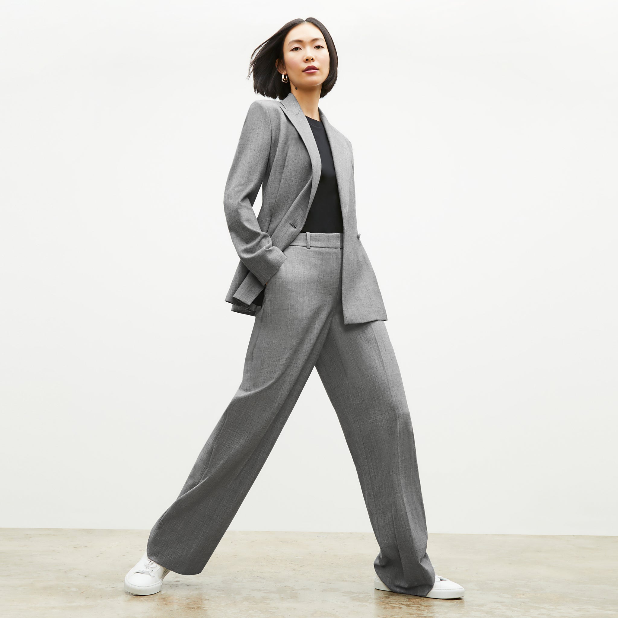 Front image of a woman wearing the Tinsley Trouser in Black / White
