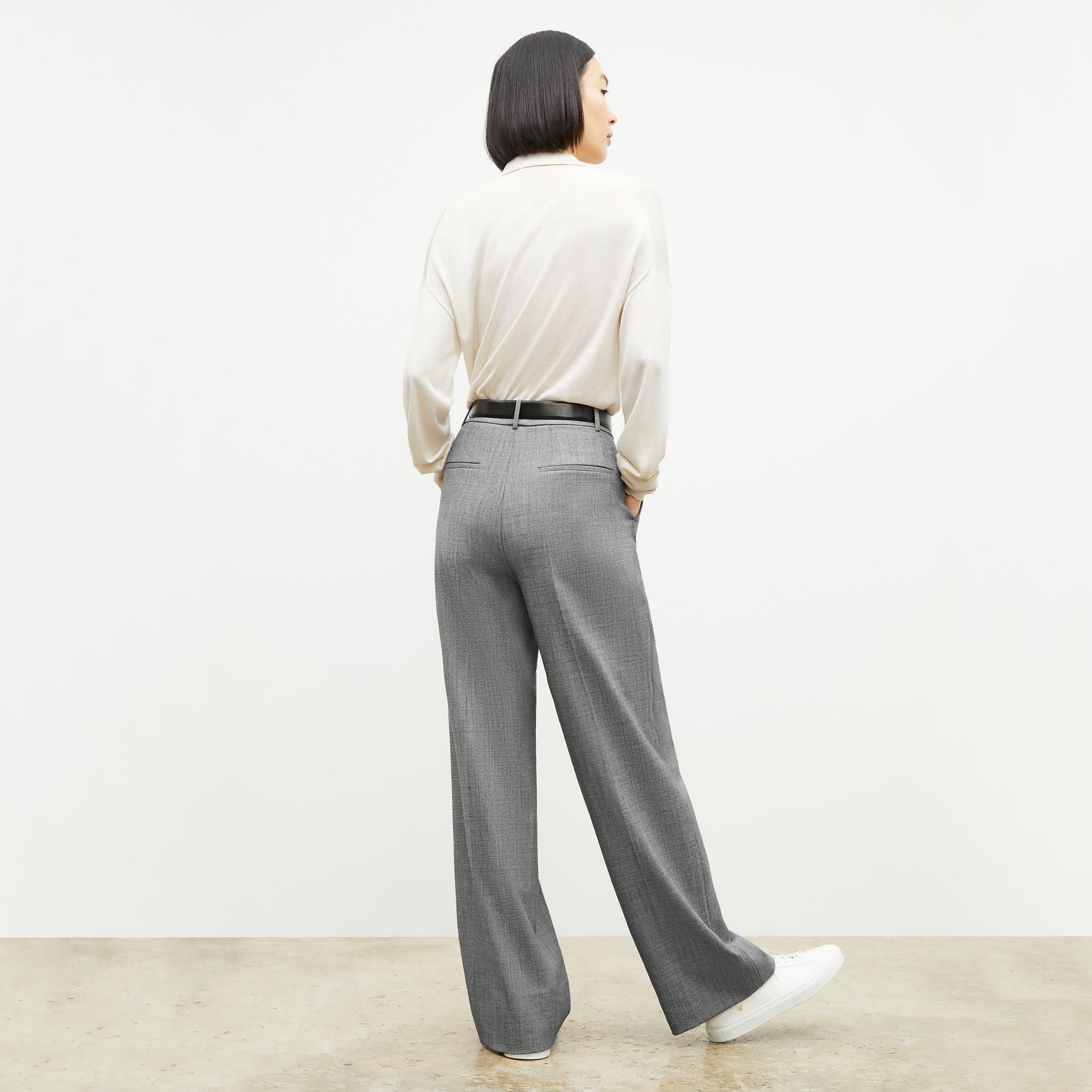 Back image of a woman wearing the Tinsley Trouser in Black / White