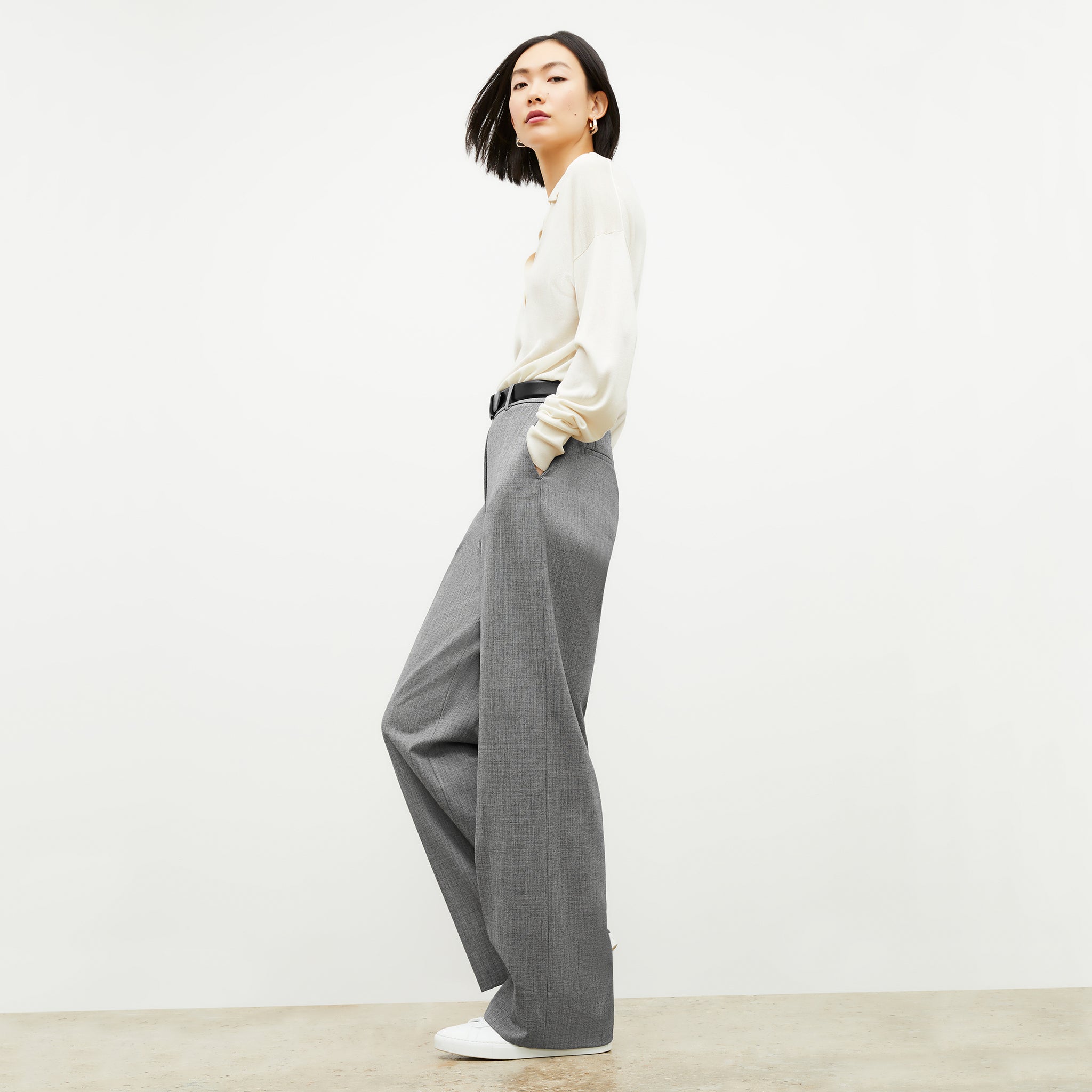 Side image of a woman wearing the Tinsley Trouser in Black / White