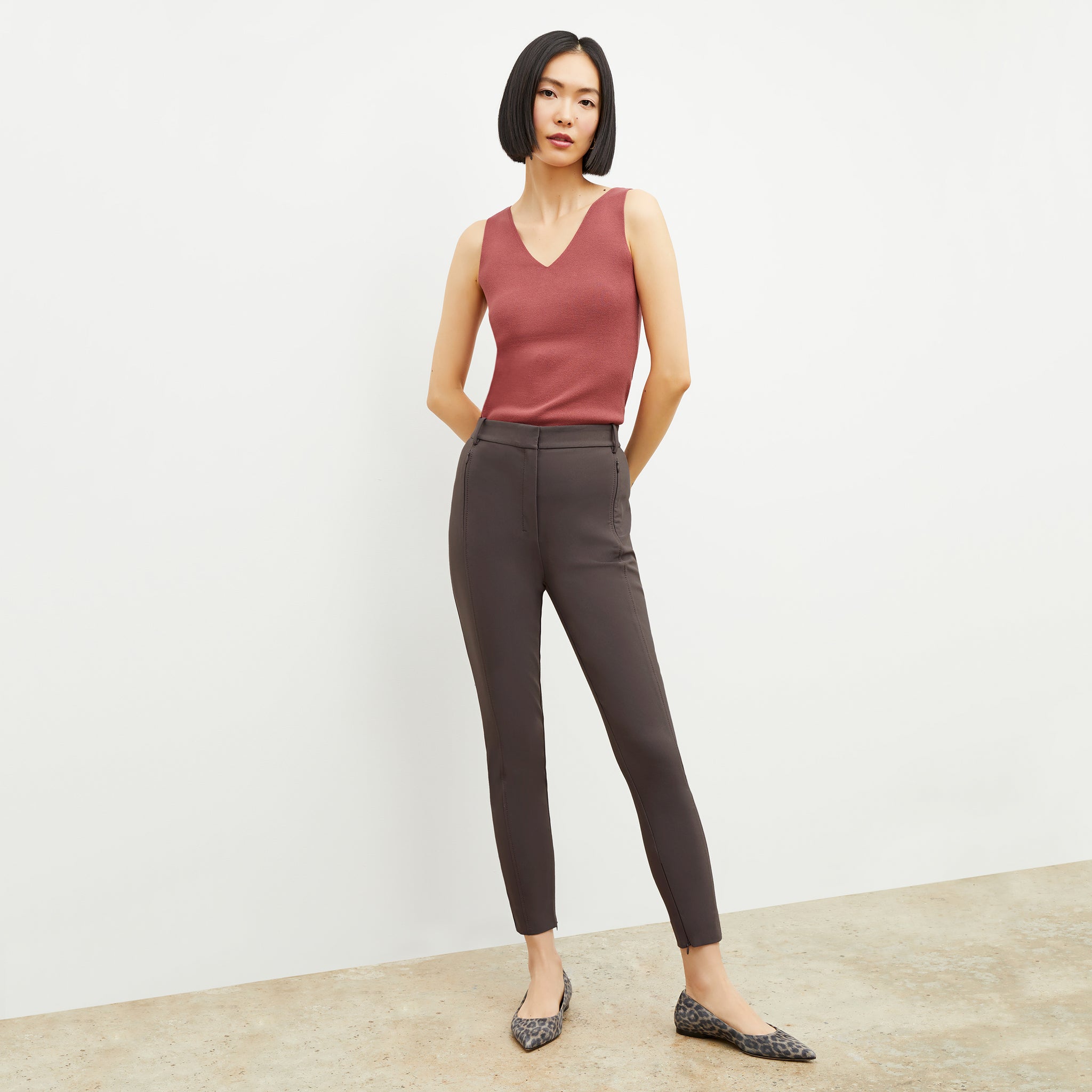 Front image of a woman wearing the Curie Pant in Dark Mink 