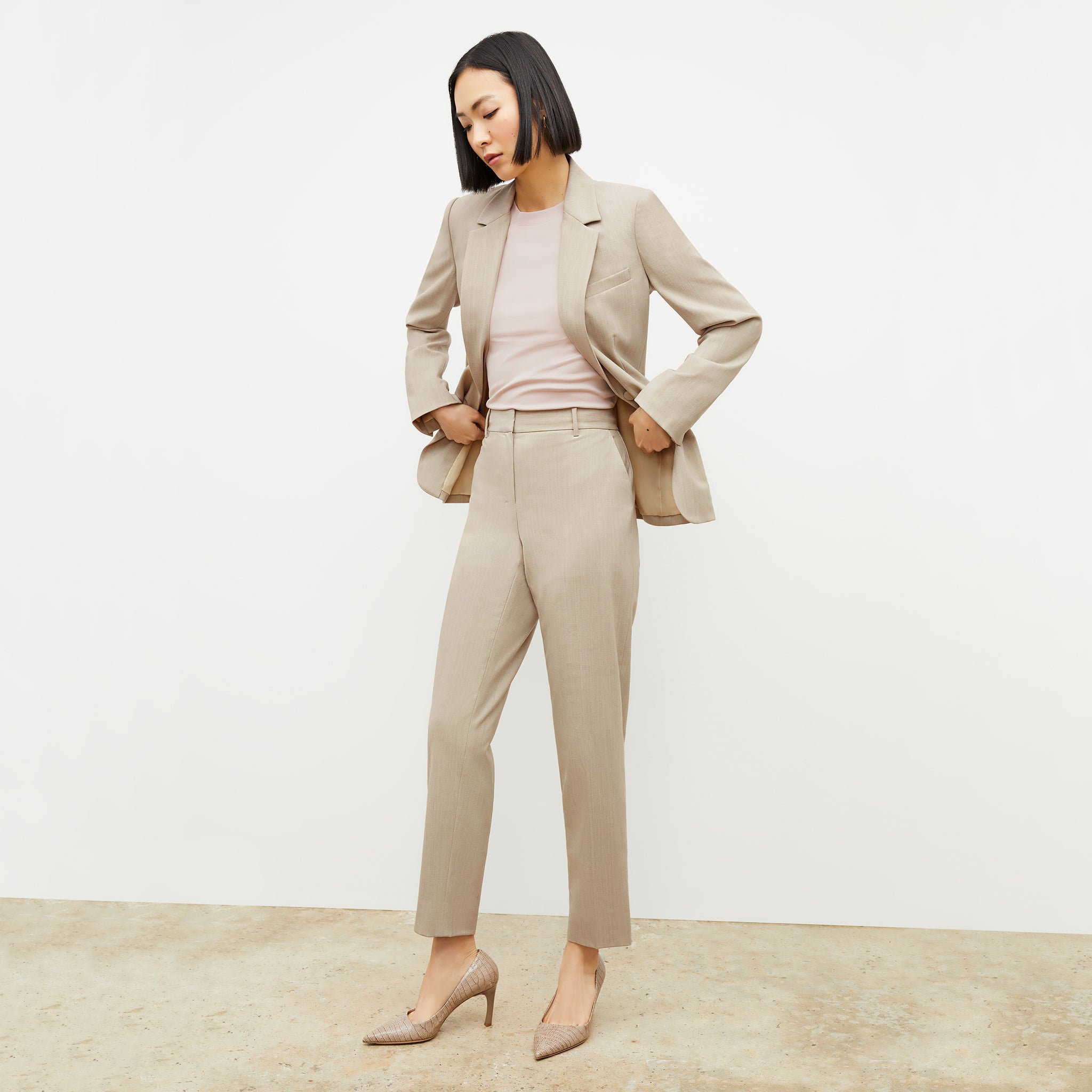 Front image of a woman wearing the Mejia Pant in Natural Melange