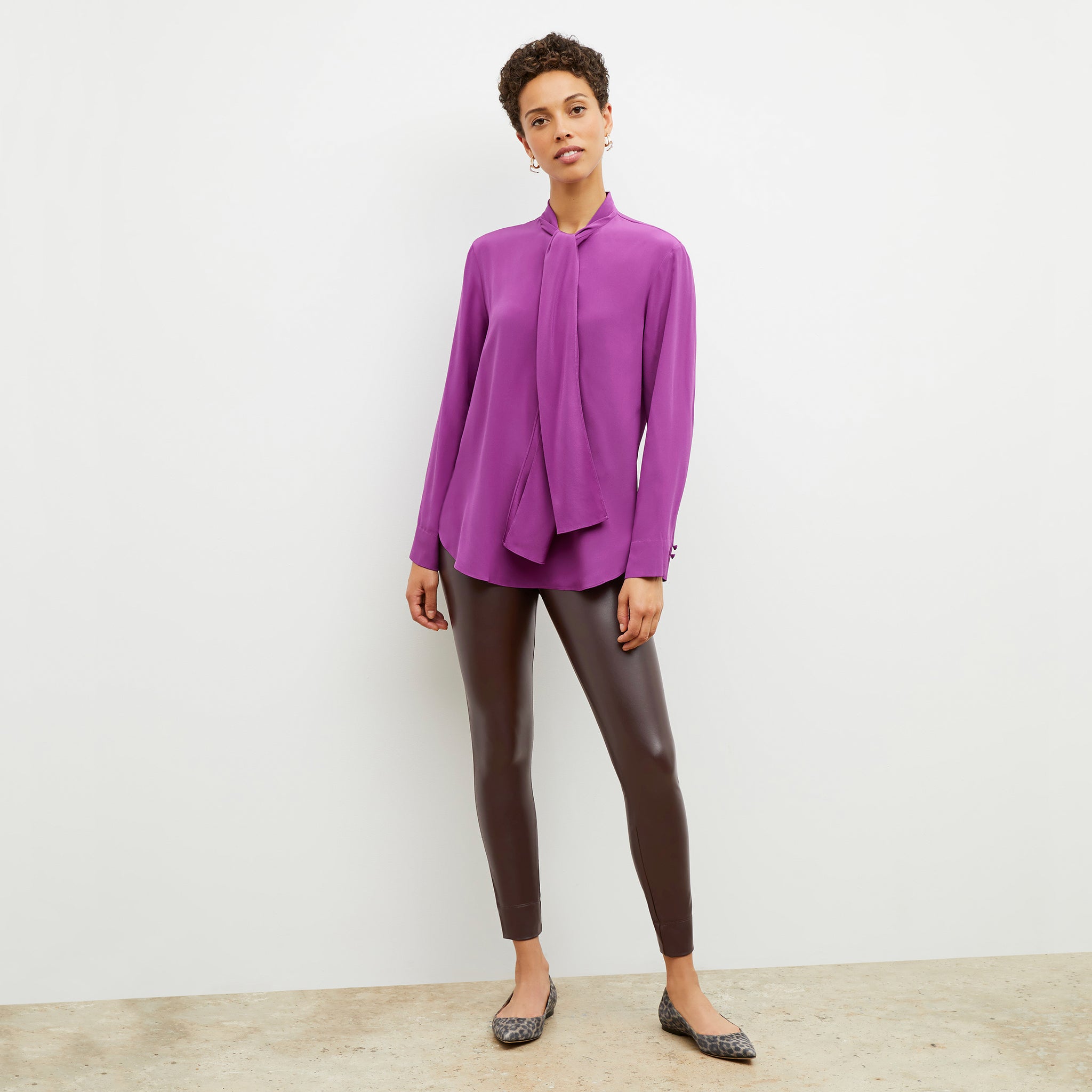 Front image of a woman wearing the Darcy Top in Purple Jasper 