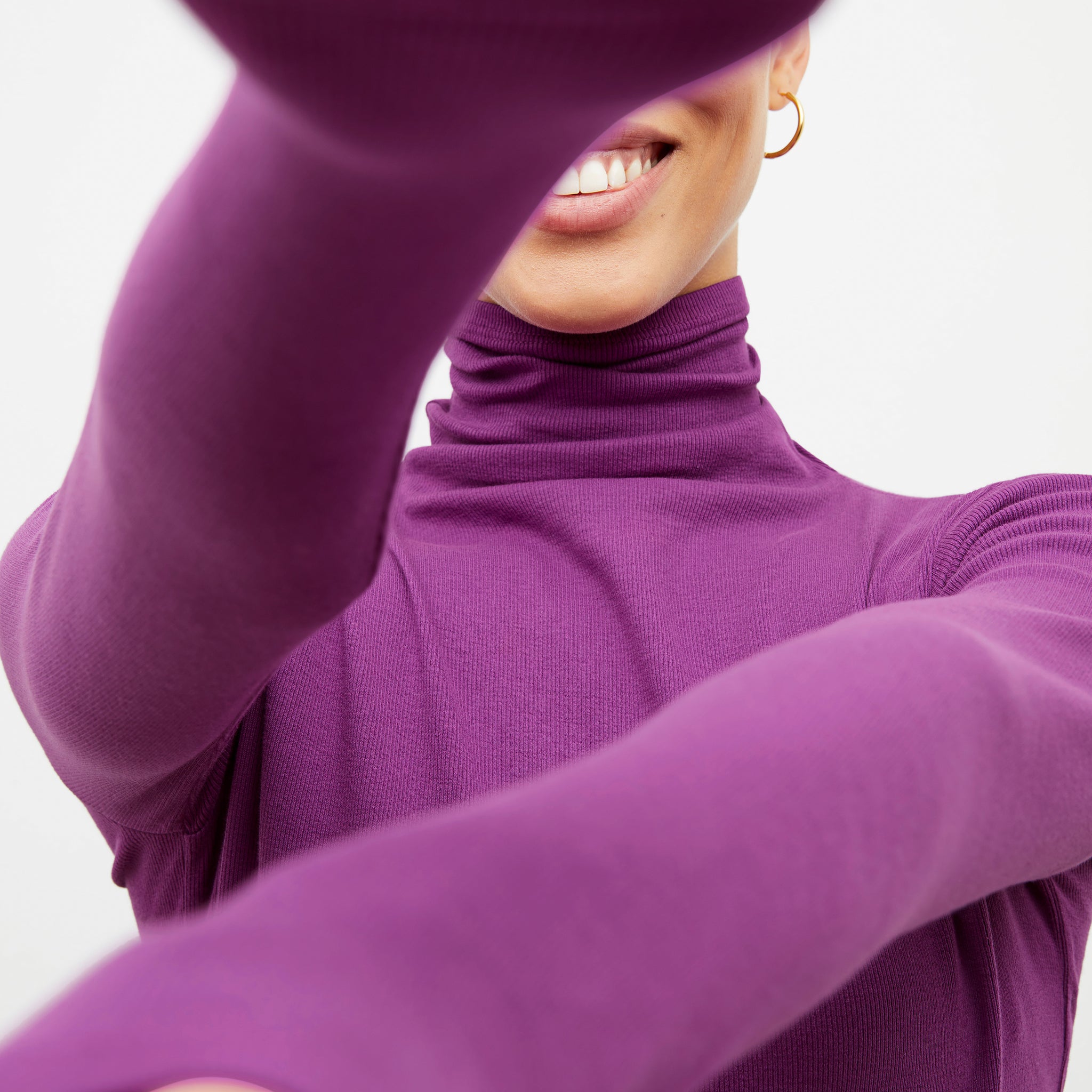 Detail image of a woman wearing the Axam T-Shirt in Purple Jasper