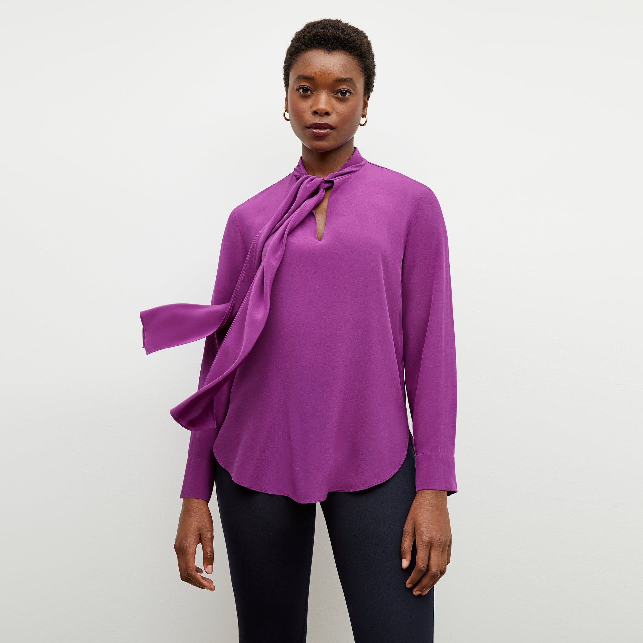 Front image of a woman wearing the Darcy Top in Purple Jasper 