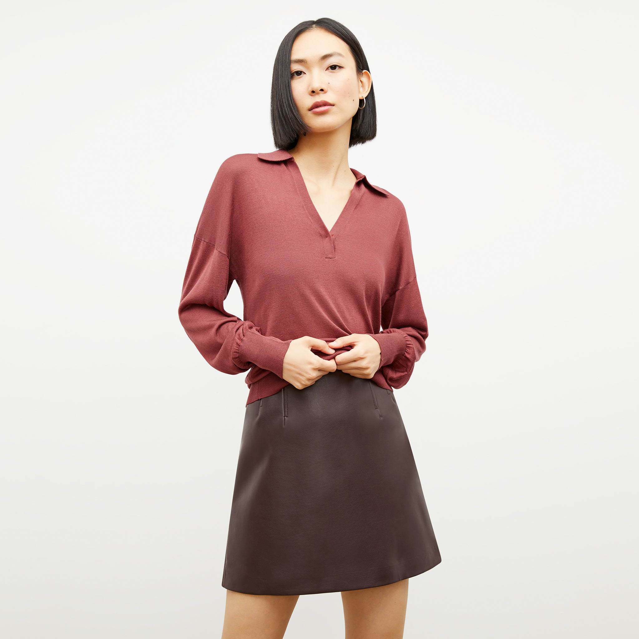 Front image of a woman wearing the Whitney Skirt in Brown 