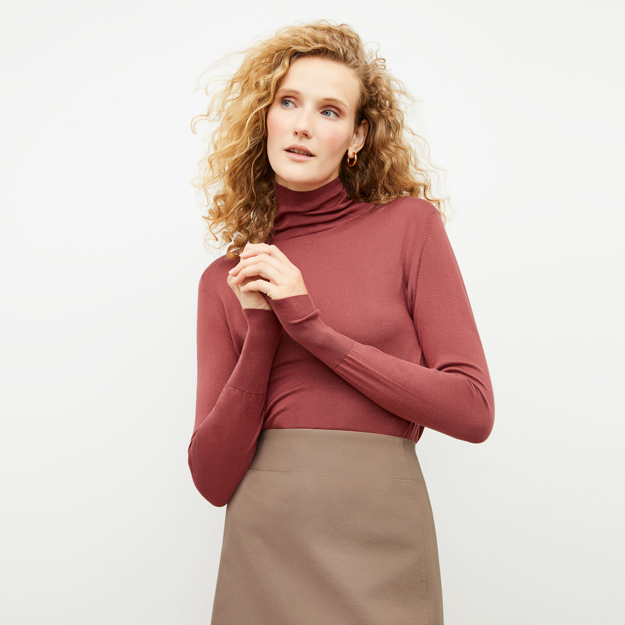 Front image of a woman wearing the Elizabeth Top in Rosewood 