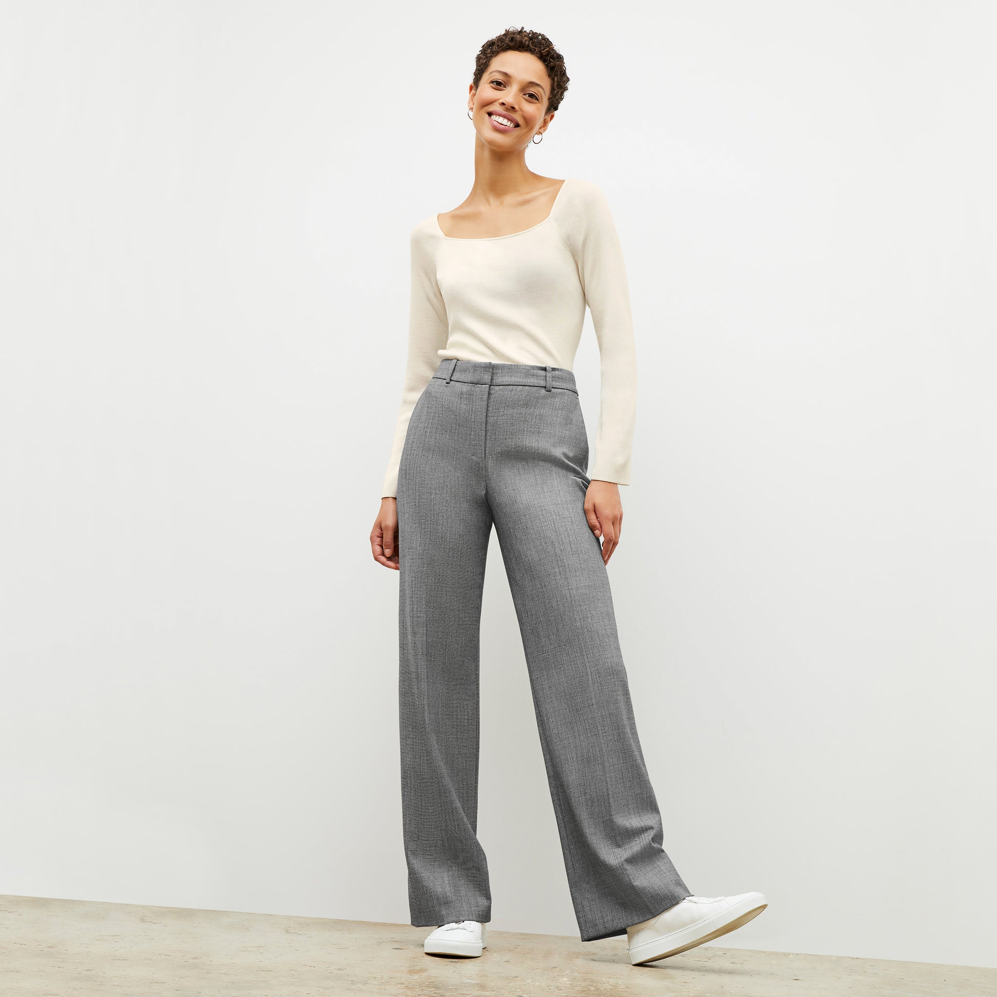 Front image of a woman wearing the Tinsley Trouser in Black / White 