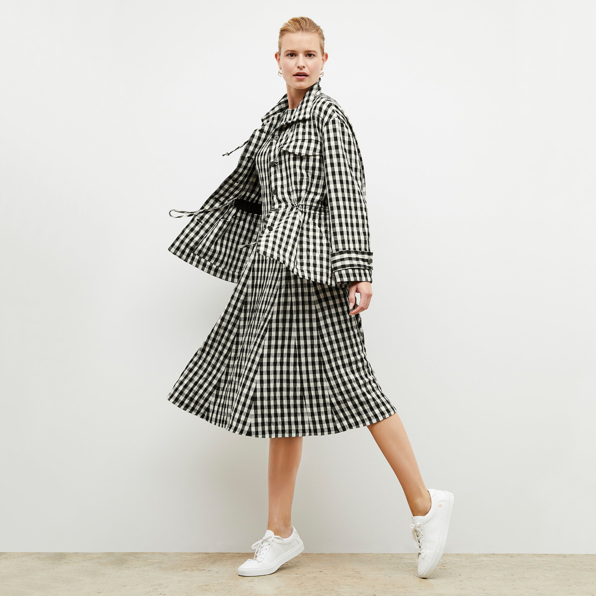 Front image of a woman wearing the Allison Anorak - Luxe Gingham in black / white