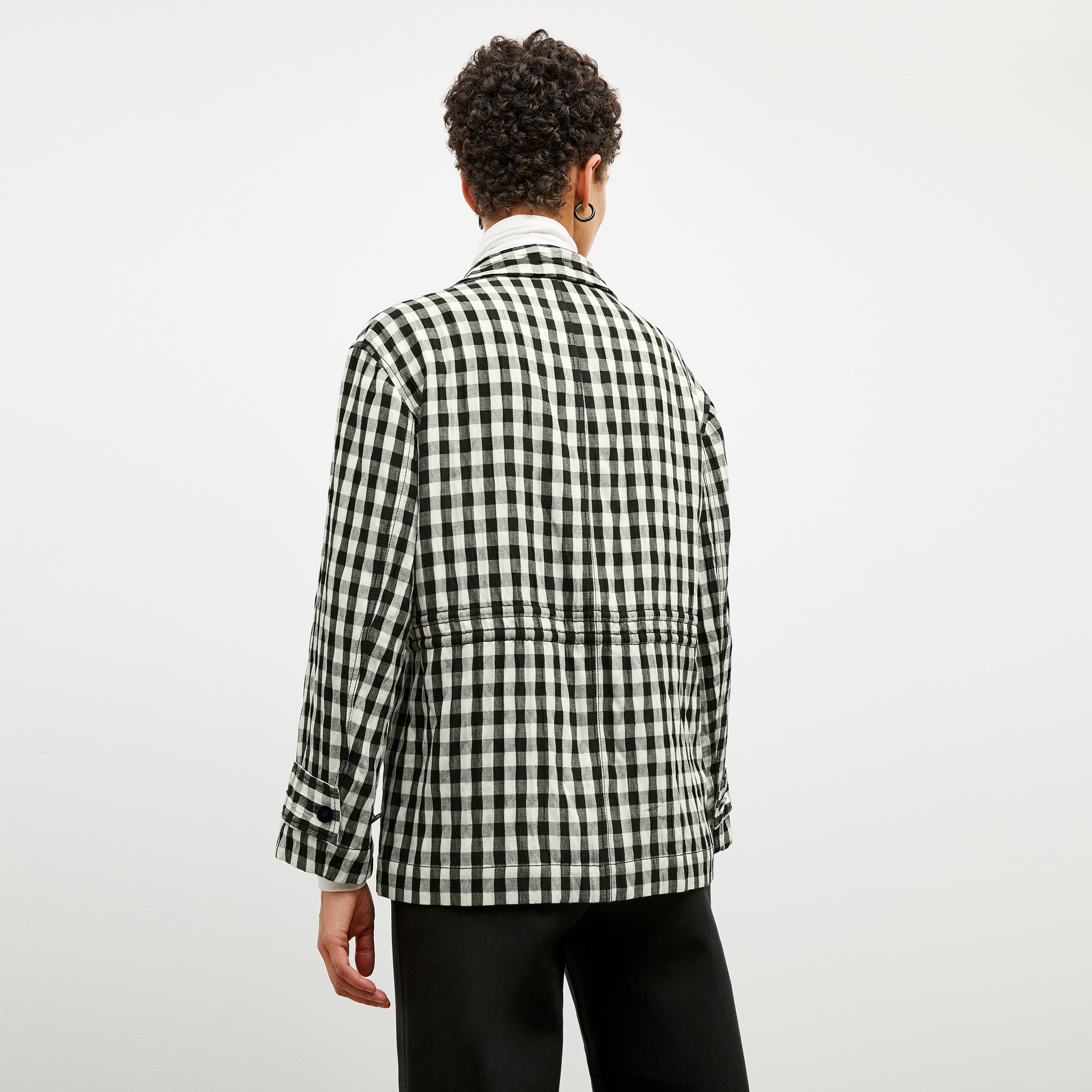 Back image of a woman wearing the Allison Anorak - Luxe Gingham in black / white