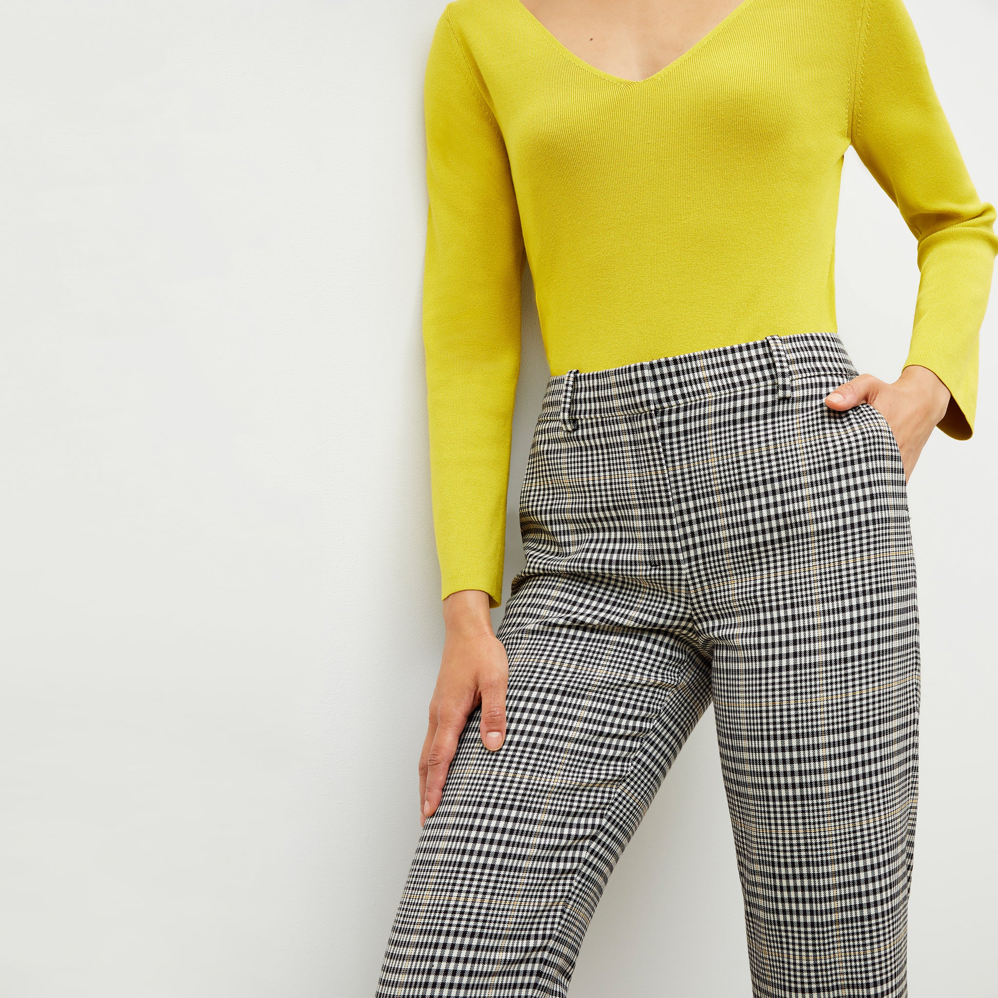 Front image of a woman wearing the mejia pant in plaid sharkskin