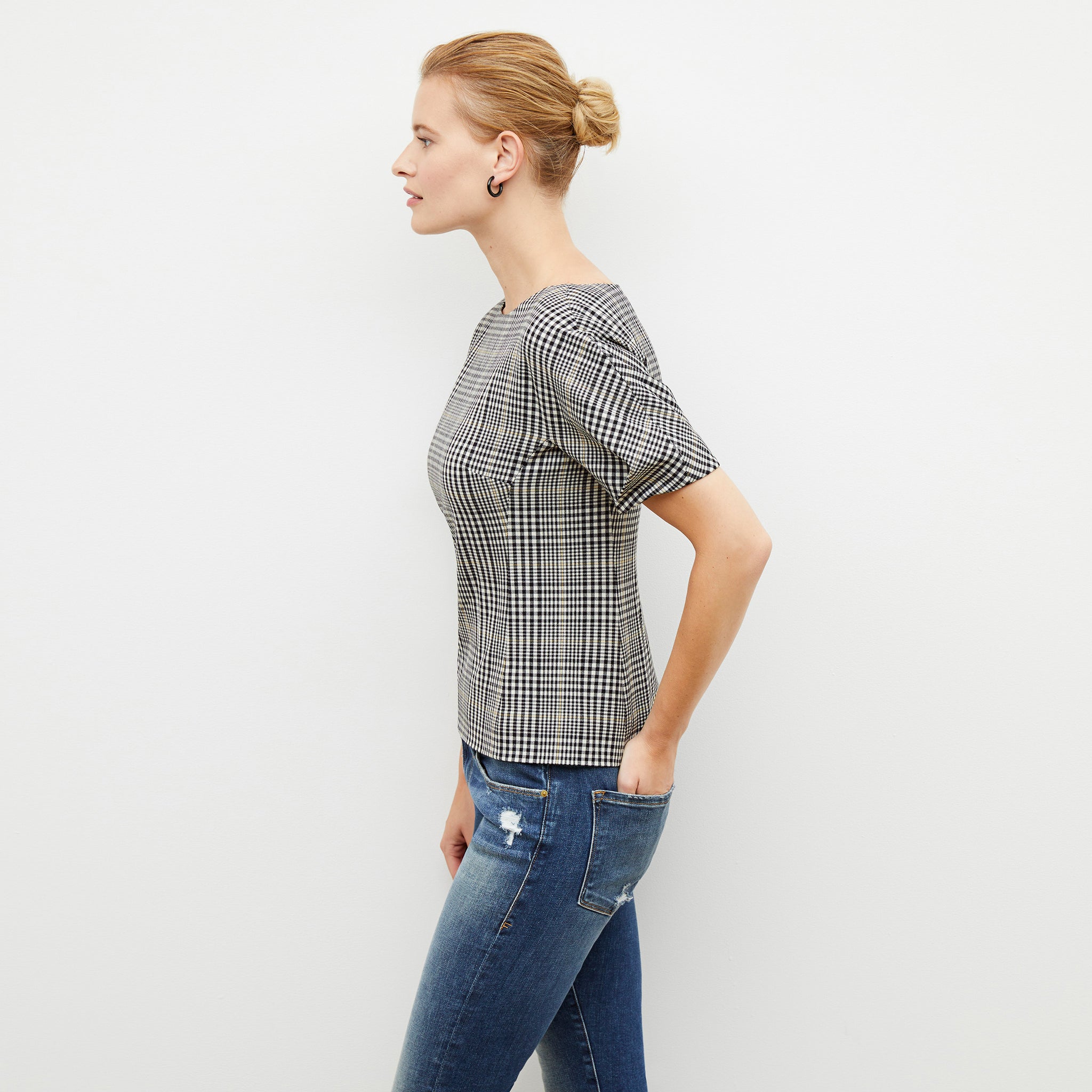 Front image of a woman wearing the eudora top in plaid sharkskin