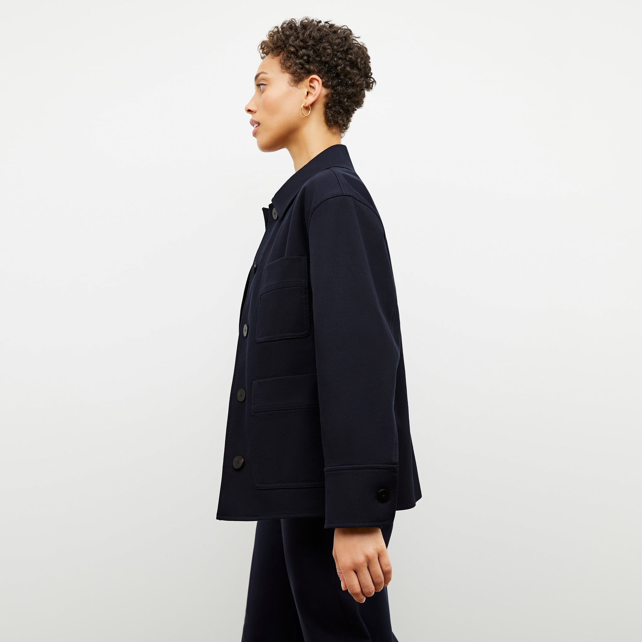 Side image of a woman wearing the steffi jacket in ink