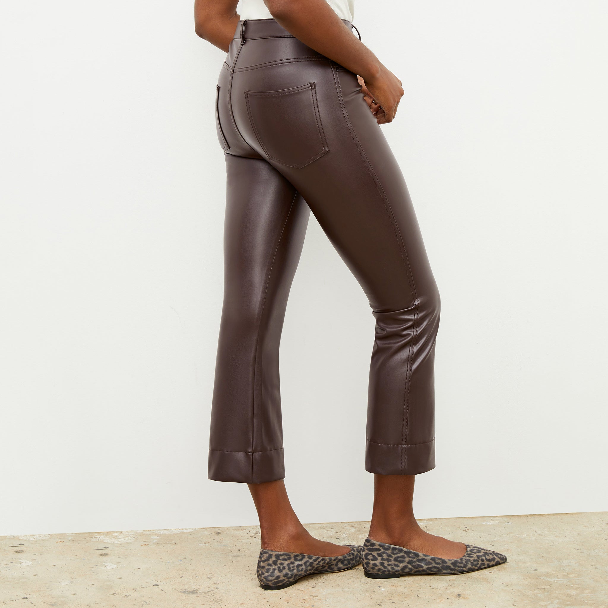 Back image of a woman wearing the archie pant in brown
