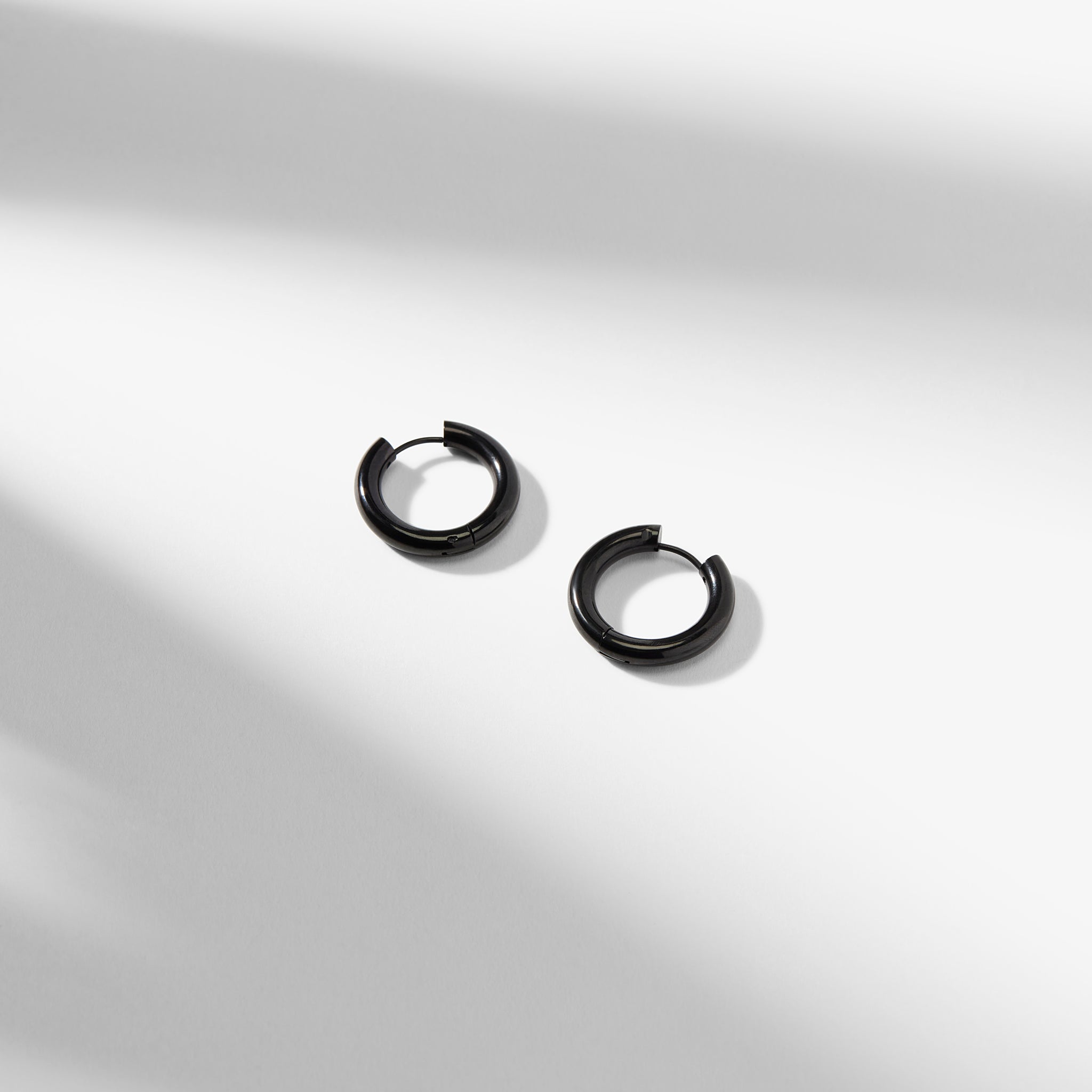 Packshot image of the Claressa Earrings in Black 