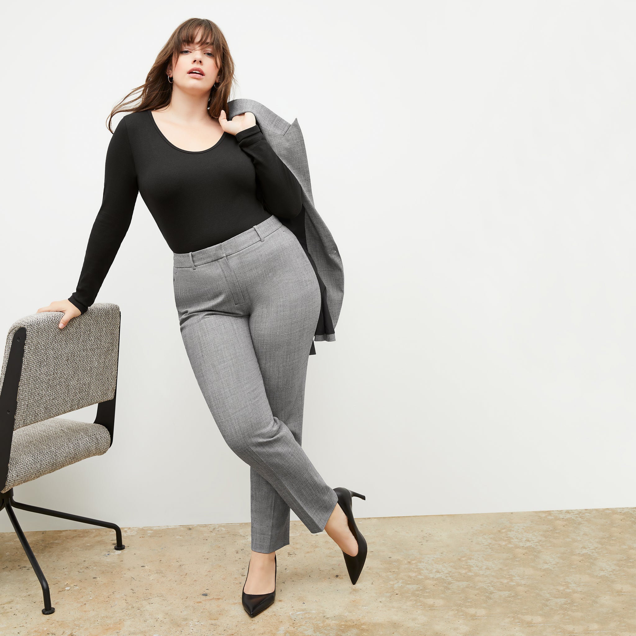 Front image of a woman wearing the Mejia Pant in Black and White Sharkskin