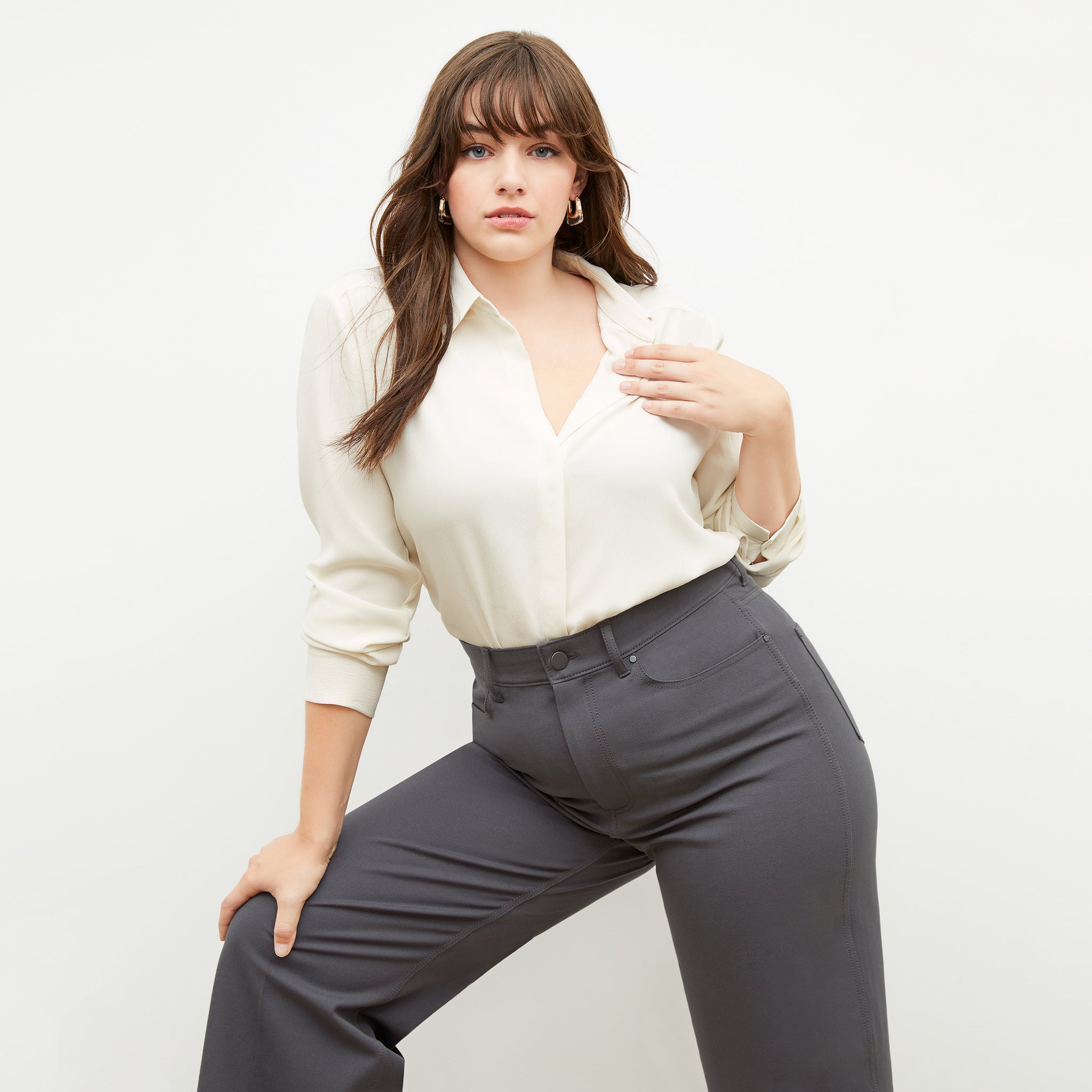 Front image of a woman sitting wearing the Milo Jean—Better Than Denim in Cool Charcoal