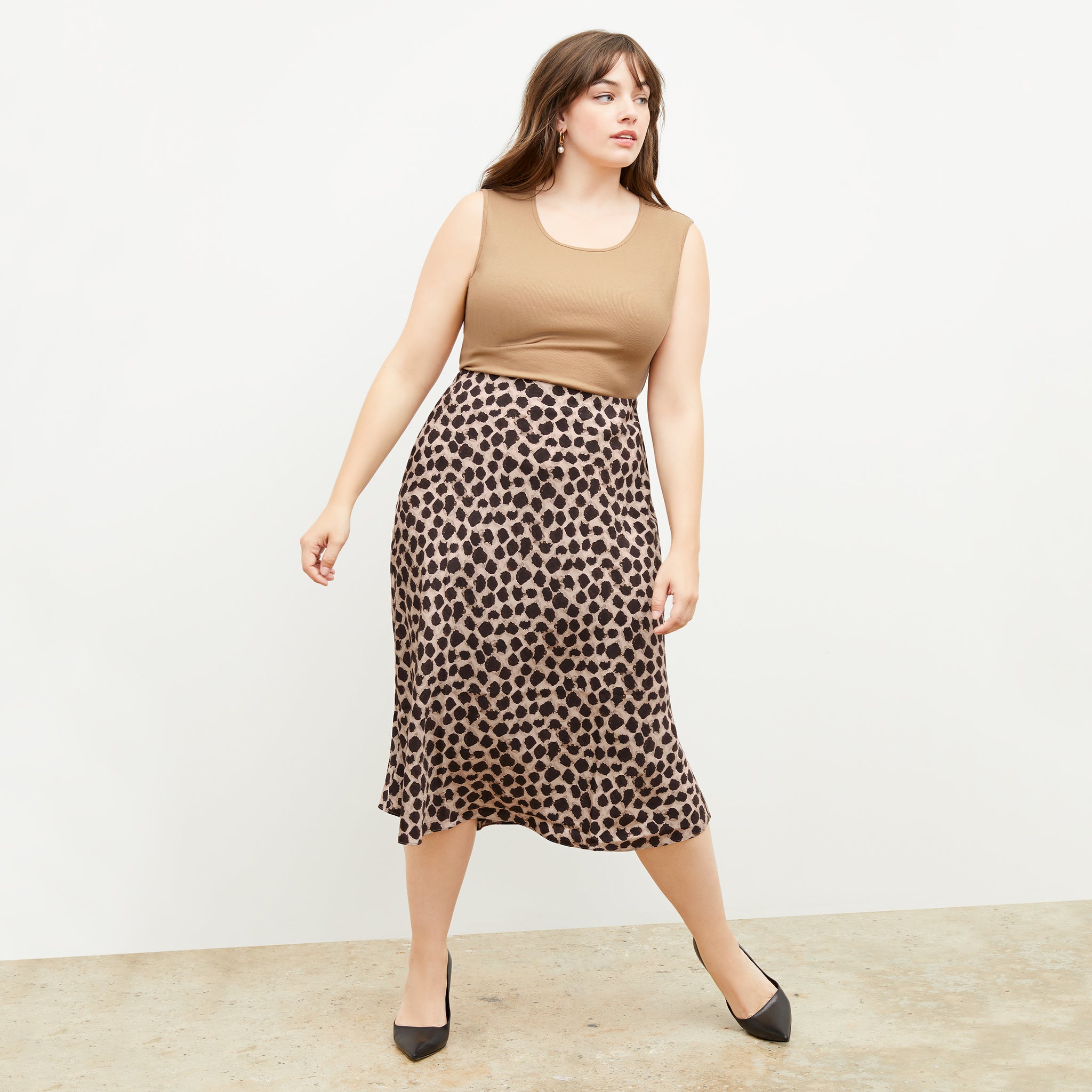 Front image of a woman wearing the orchard skirt in sahara print