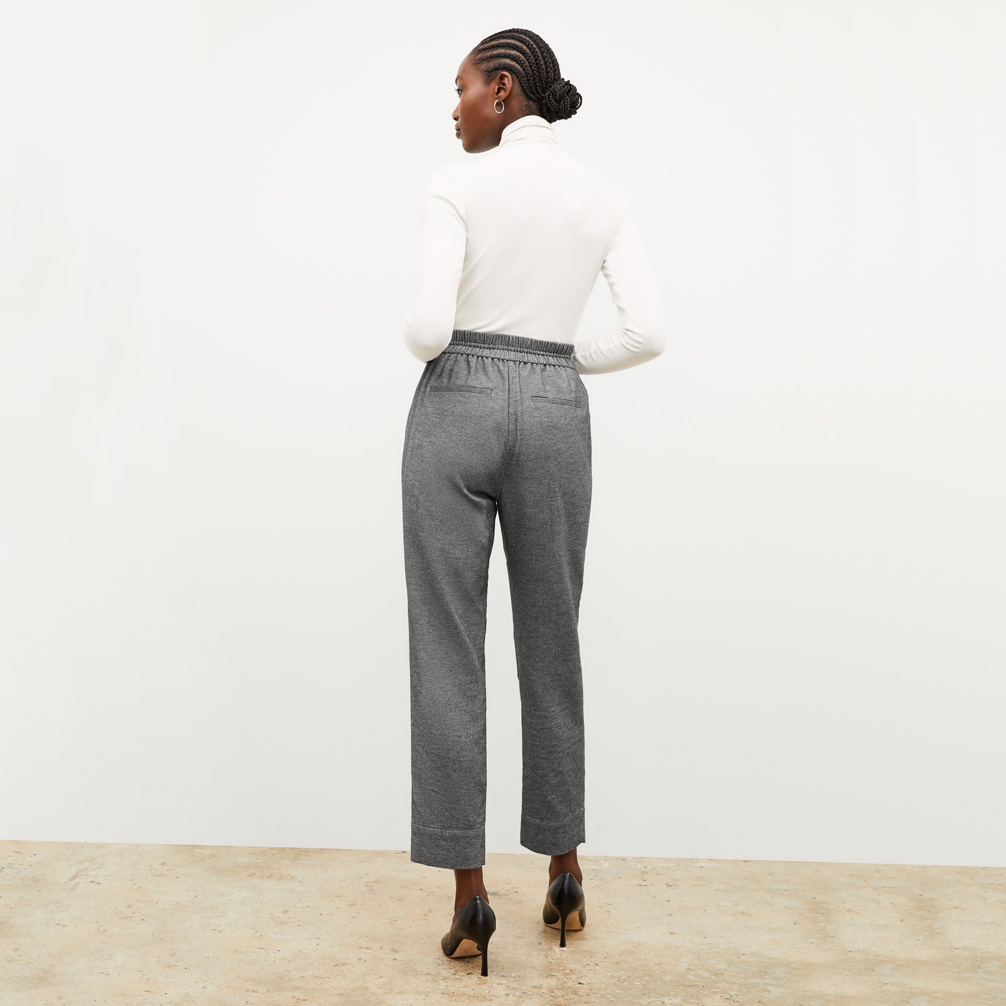 Back image of a woman wearing the shane pant in flannel twill