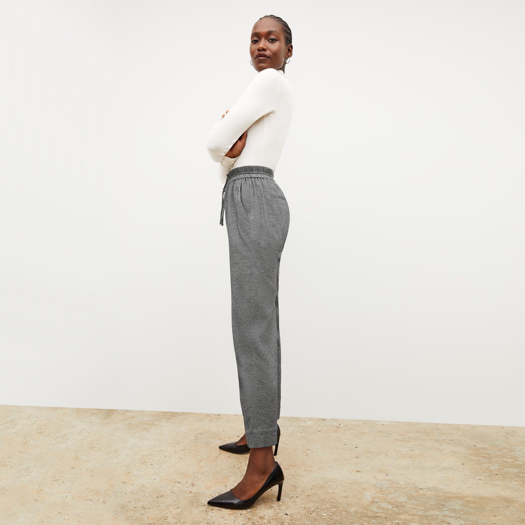 Side image of a woman wearing the shane pant in flannel twill