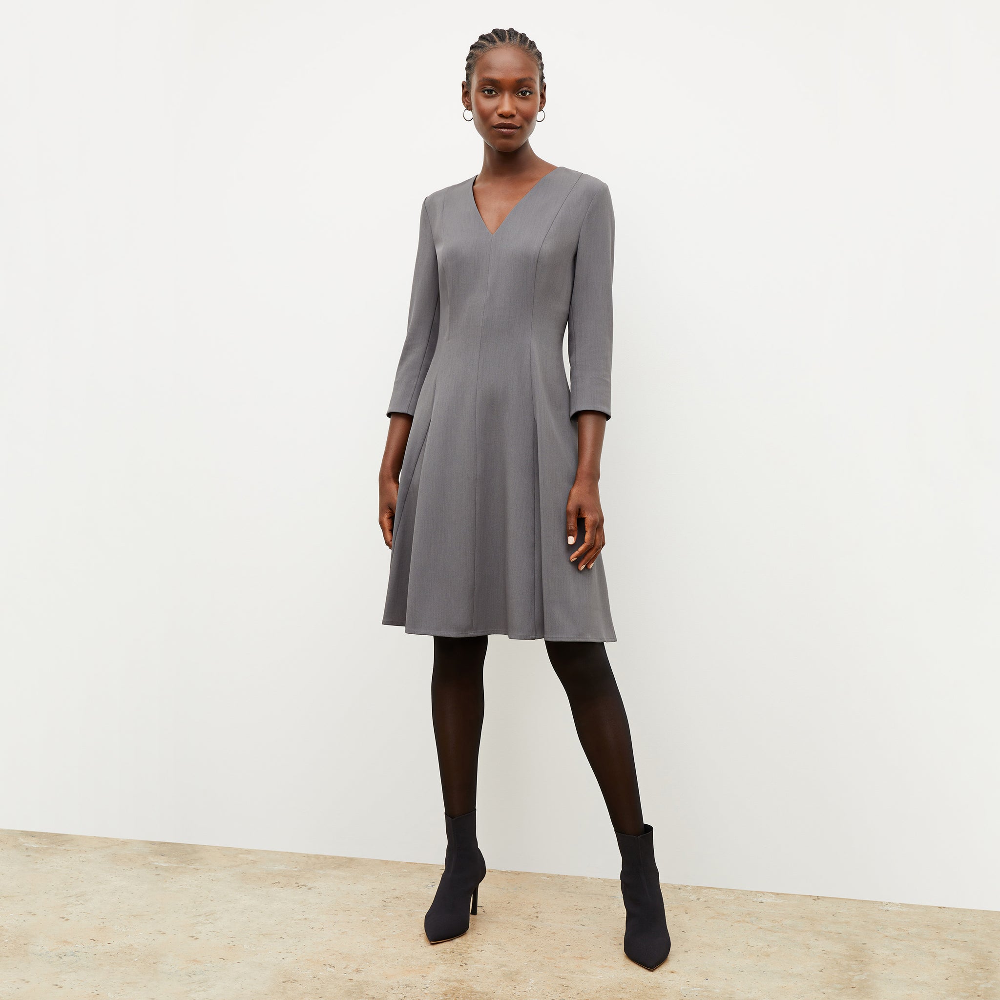 Image of a woman wearing the Erica Dress in Steel Gray 