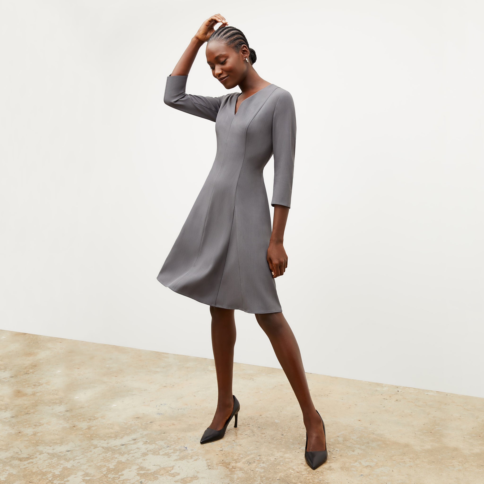 Image of a woman wearing the Erica Dress in Steel Gray
