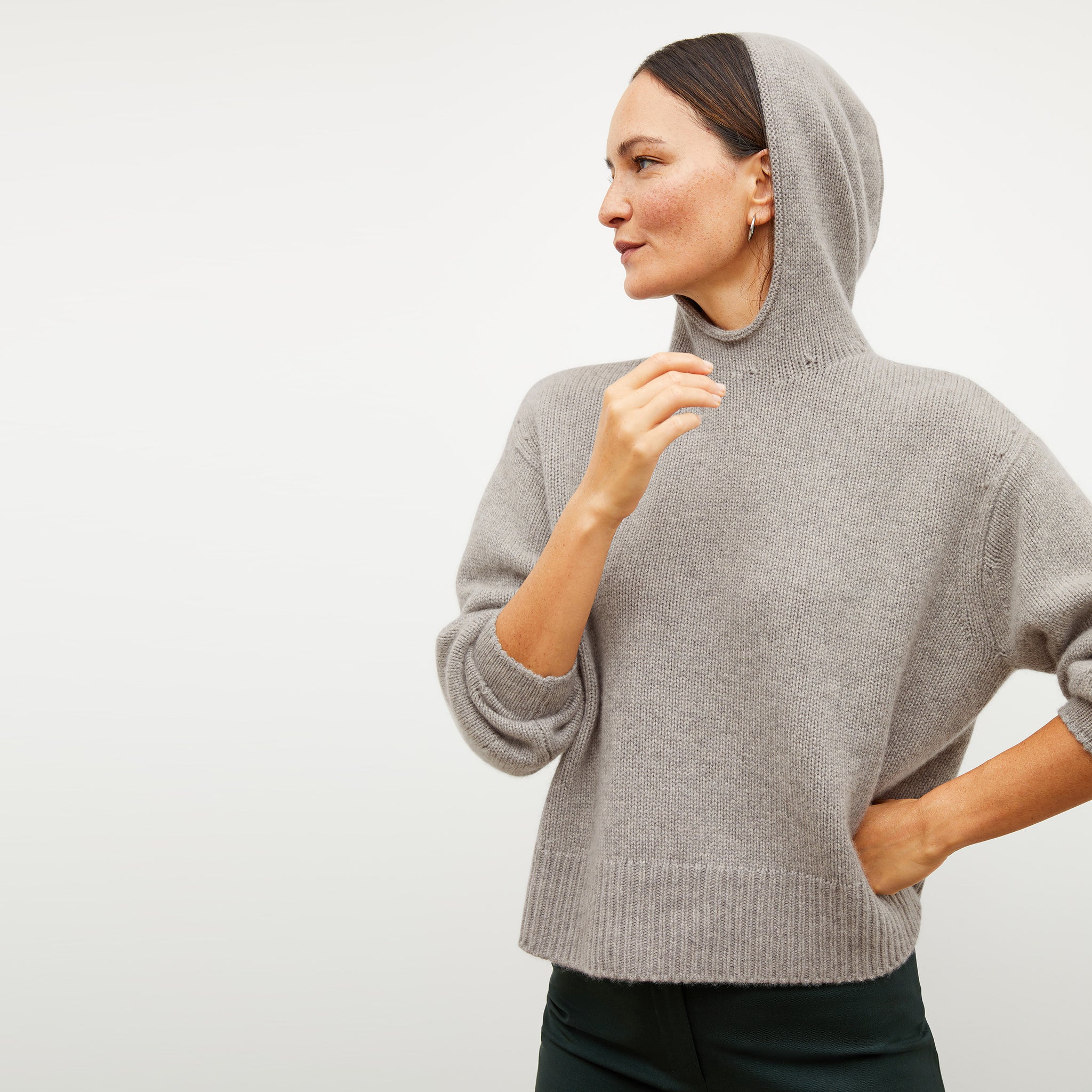 Front image of a woman wearing the thomas sweater in stormcloud