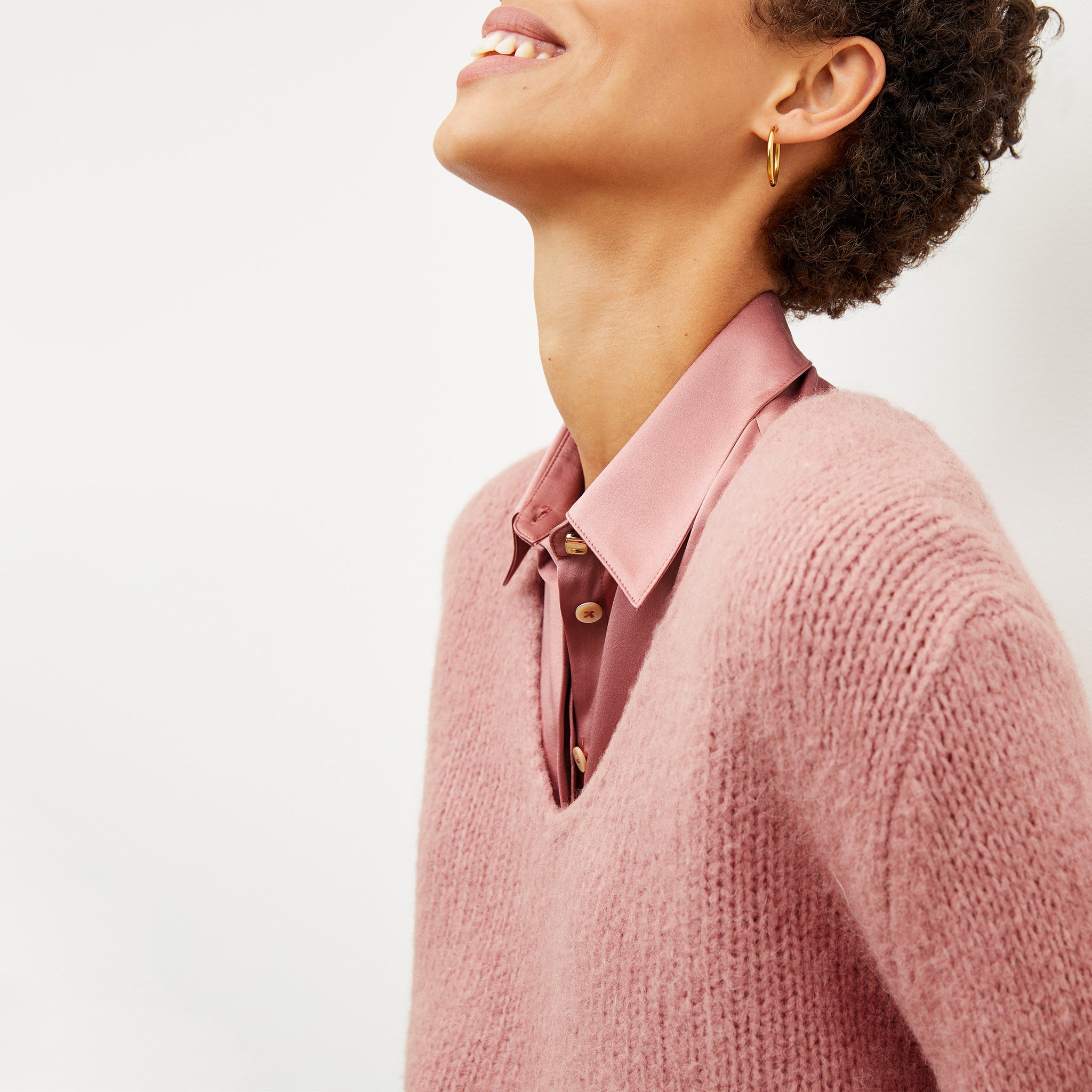 Front image of a woman wearing the cathy sweater in himilayan salt